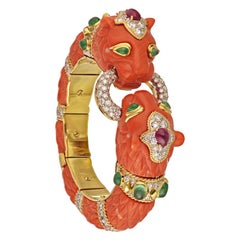 David Webb Coral Double Lion Head Bangle Bracelet