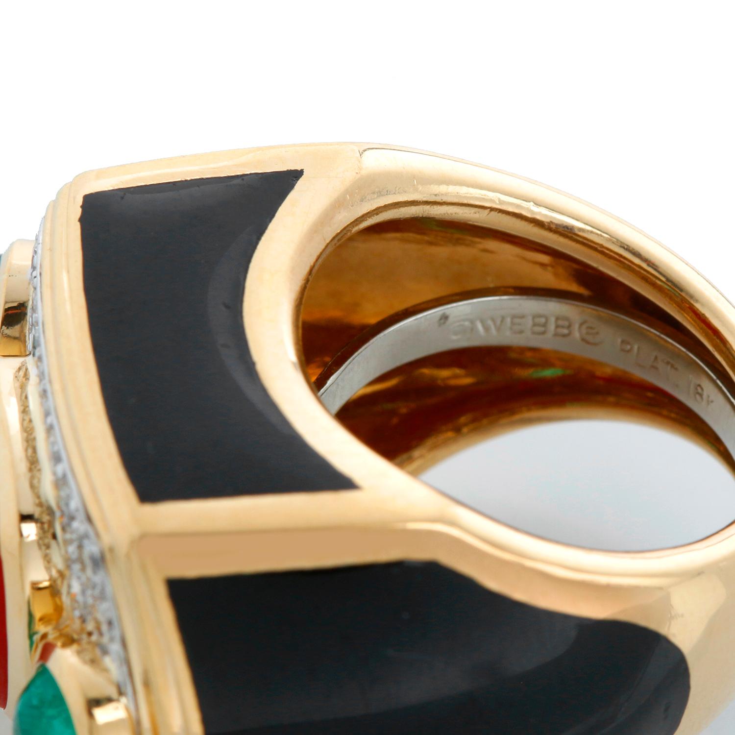 David Webb Coral, Emerald, Diamond, Onyx, Gold Ring  Size 7 - Geometric design, centering a coral cabochon, the corners set with emerald cabochons, accented by round diamonds and black enamel. Signed David Webb. 18 karat gold and platinum. Pre-owned