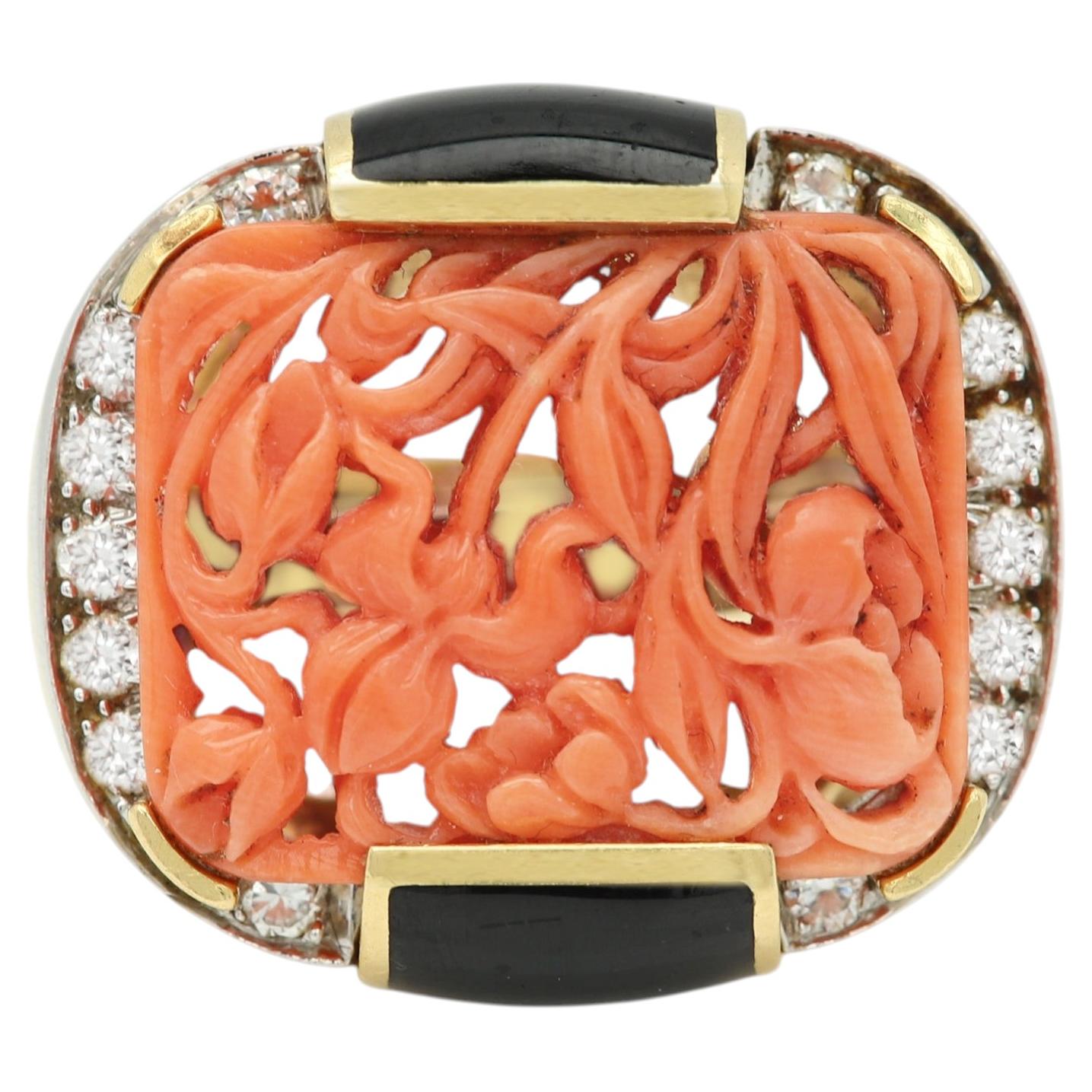 David Webb: Coral, coche clásico, motivos florales tallados, platino y esmalte negro de 18k con diamantes
