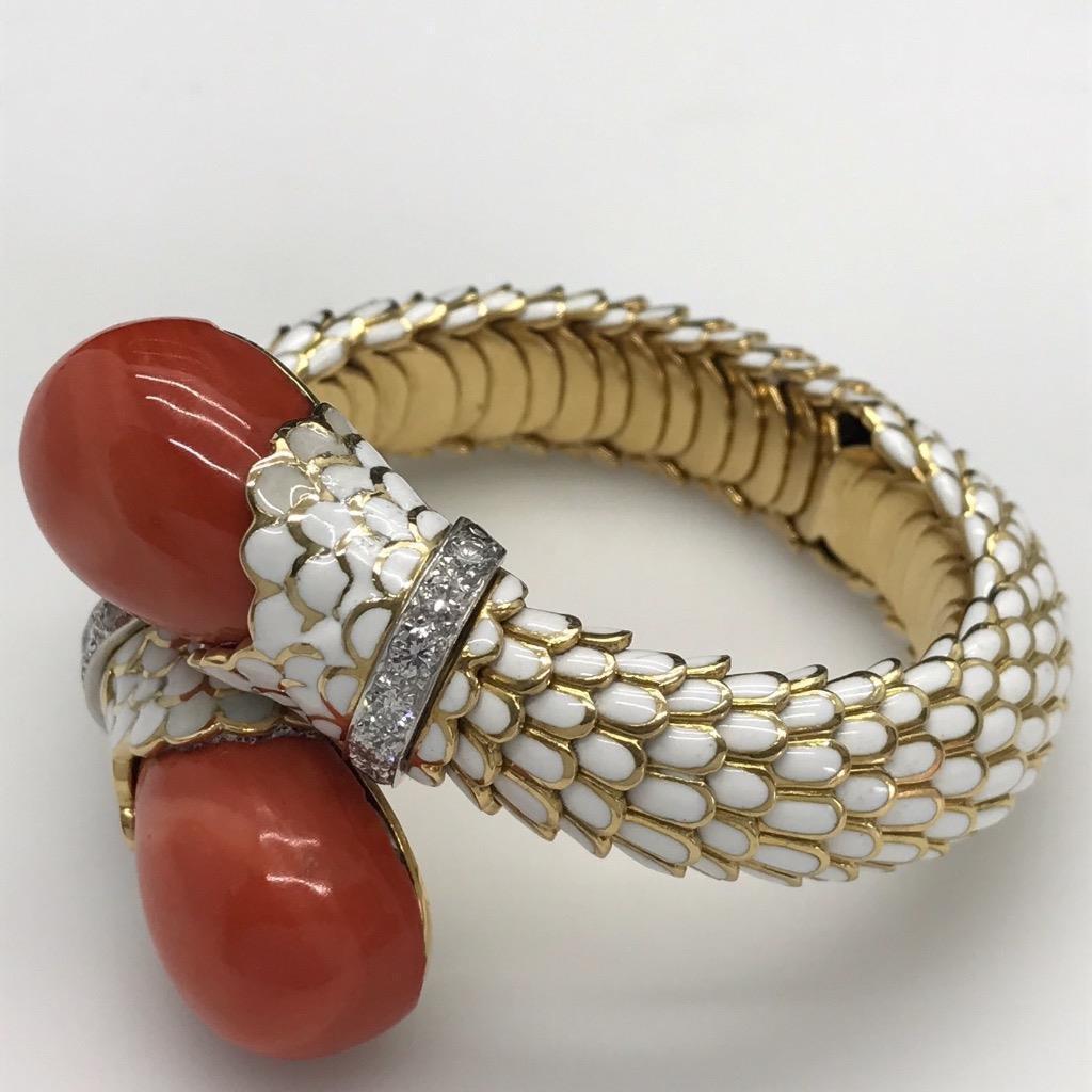 Brand: David Webb 

Style: Bracelet / Bangle 

Material: 18K Yellow Gold & Platinum 

Accent Stones: Diamonds 1.60ctw F-G / VS 

Main Stone: Coral 

Weight: 137.60 Grams 

Includes: Elegant Bracelet Box 