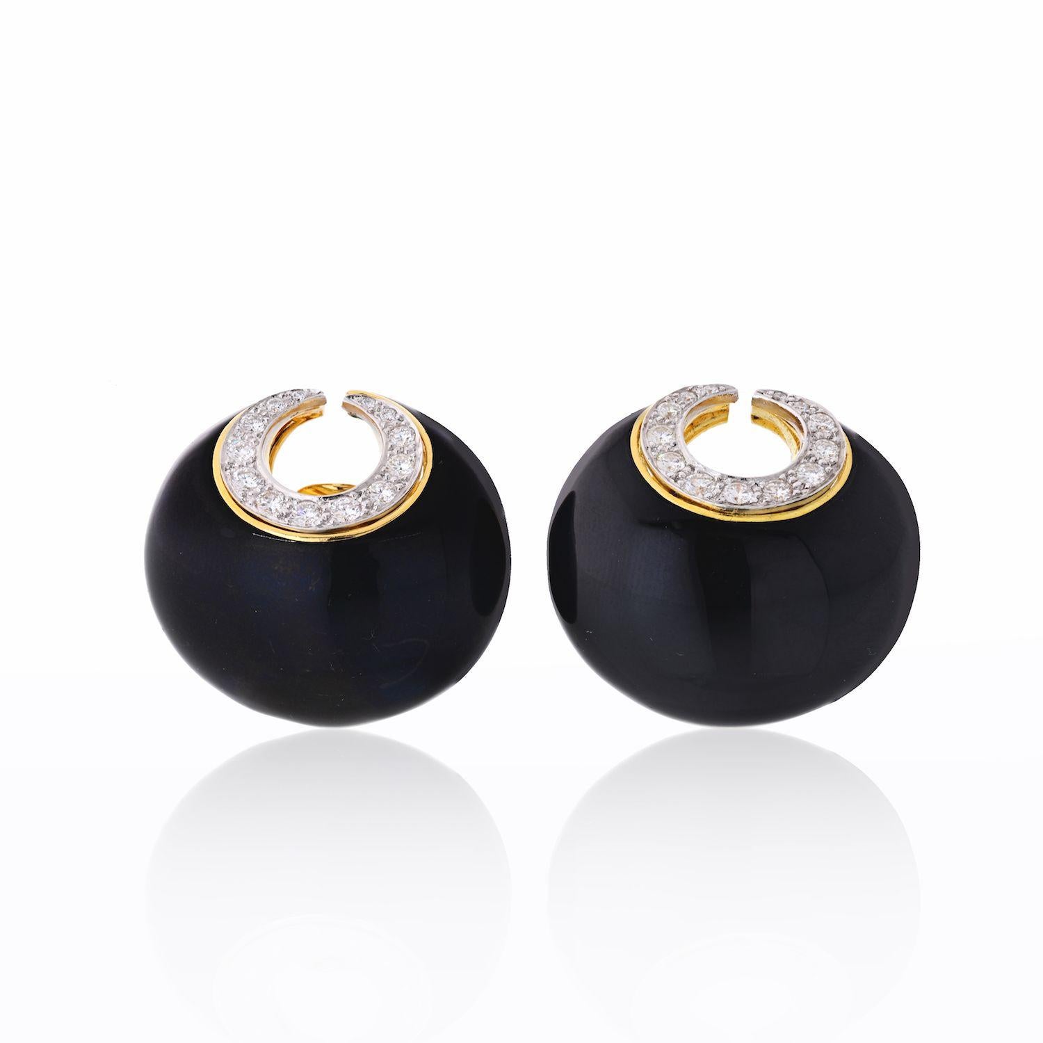 David Webb black enamel and diamond crescent ear-clips. Make a statement in these oversized bombe clip-earrings. Slick black enamel and a touch of diamonds adds enough glam and make a huge impact. 
These earrings are in perfect condition and show no