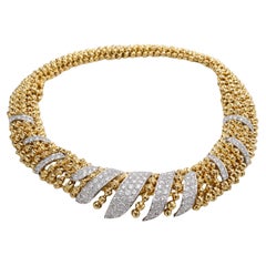 David Webb Bracciale con collana convertibile in oro 18 carati e platino David Webb Bracciale con collana convertibile in oro 18 carati e platino