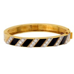 David Webb diamond 18k yellow gold black enamel bangle