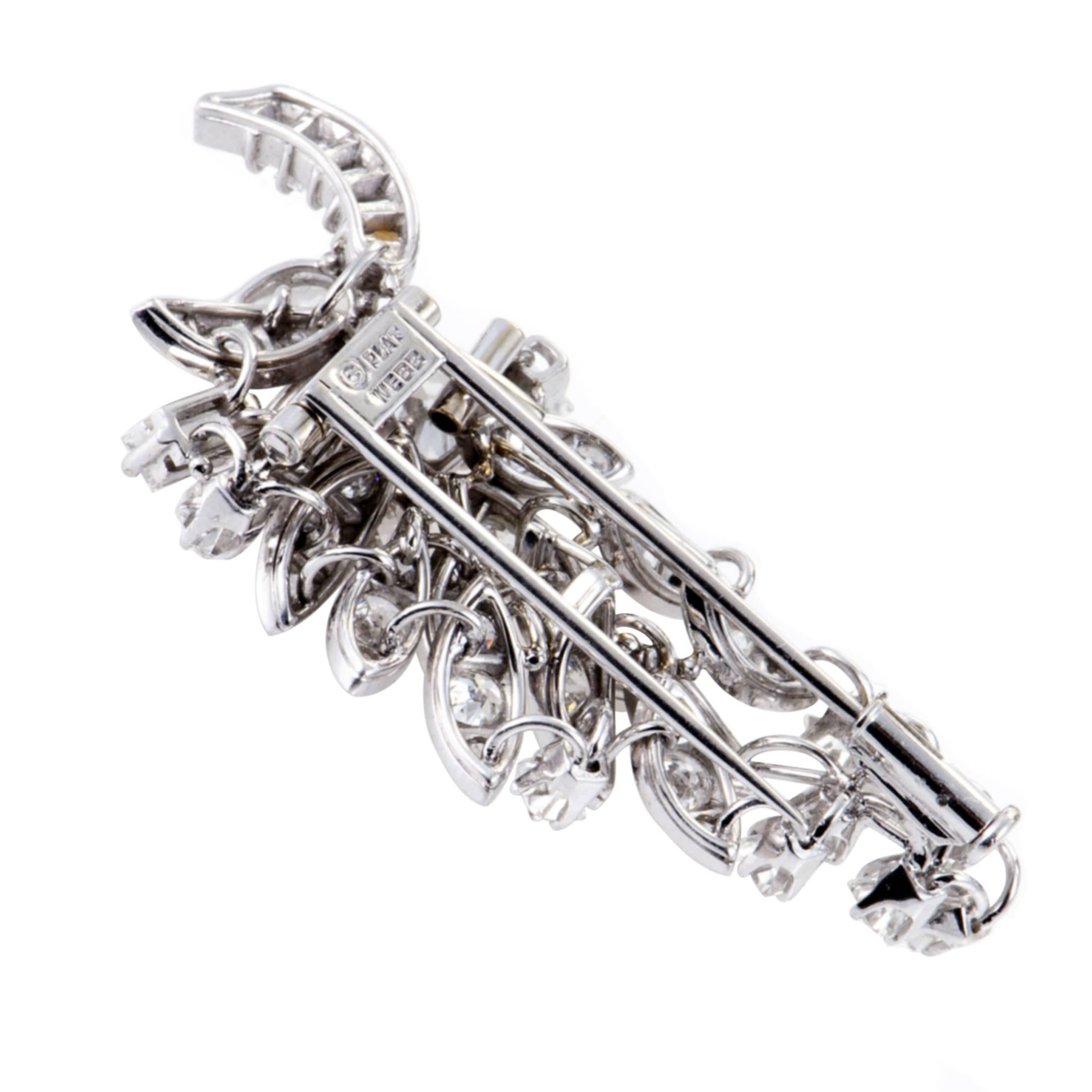 A sight of unblemished prestige and glamorous resplendence, this amazing brooch from David Webb is made of gleaming platinum and embellished with dazzling F-color diamonds of VS clarity weighing in total approximately 5.50 carats.