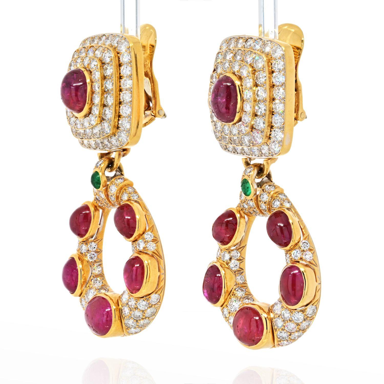 David Webb Diamond and Ruby Door Knocker Earrings.

These beautiful David Webb door knocker earrings are crafted in 18k yellow gold and platinum and feature beautiful deep-color cabochon rubies and round diamonds. 

Each earring can be worn as day