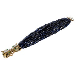 David Webb Bracelet double léopard en or et platine avec perles de diamants et saphirs