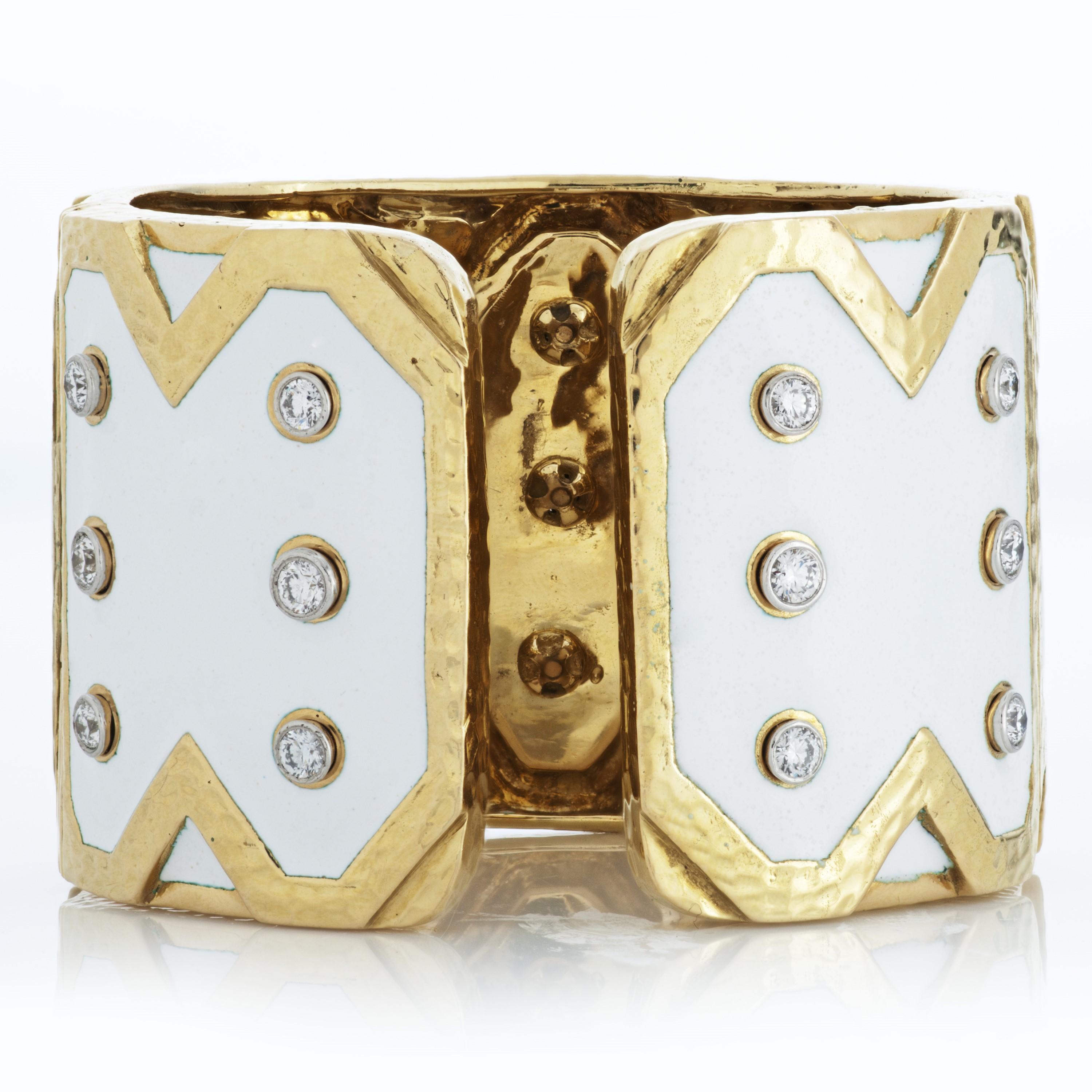 David Webb white enamel and diamond Rickrack cuff bracelet in 18k yellow gold, accompanied by a David Webb box and David Webb Certificate of Authenticity.   

This bracelet features approximately 2.82 carats of collet-set round brilliant cut