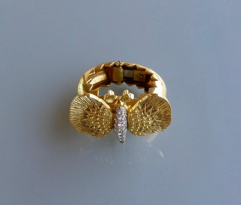 David Webb was nothing if not bold, courageous and original and this one of a kind hair clip is a perfect example.  The combination of textured gold and bright, white diamonds is true to his style and the pure originality of the piece is what sets