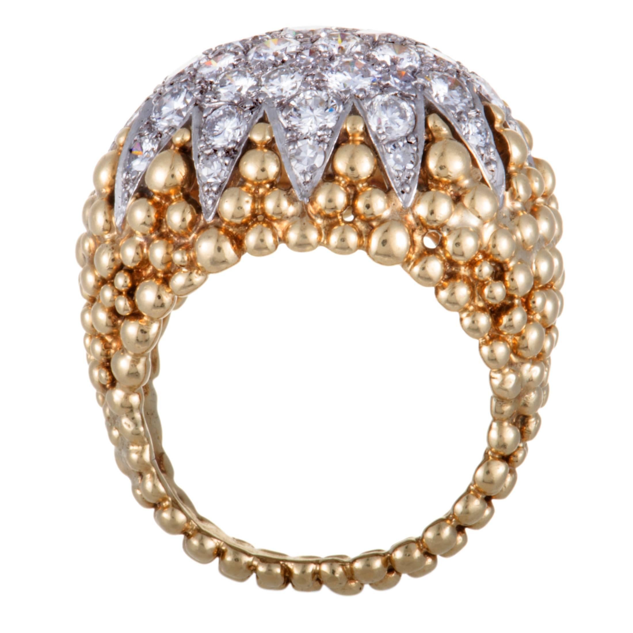 If you wish to accentuate your look with a jewelry piece that exudes luxurious prestige and refined extravagance then this fabulous David Webb ring is a perfect choice. The ring is made of 18K yellow and platinum and it is expertly set with