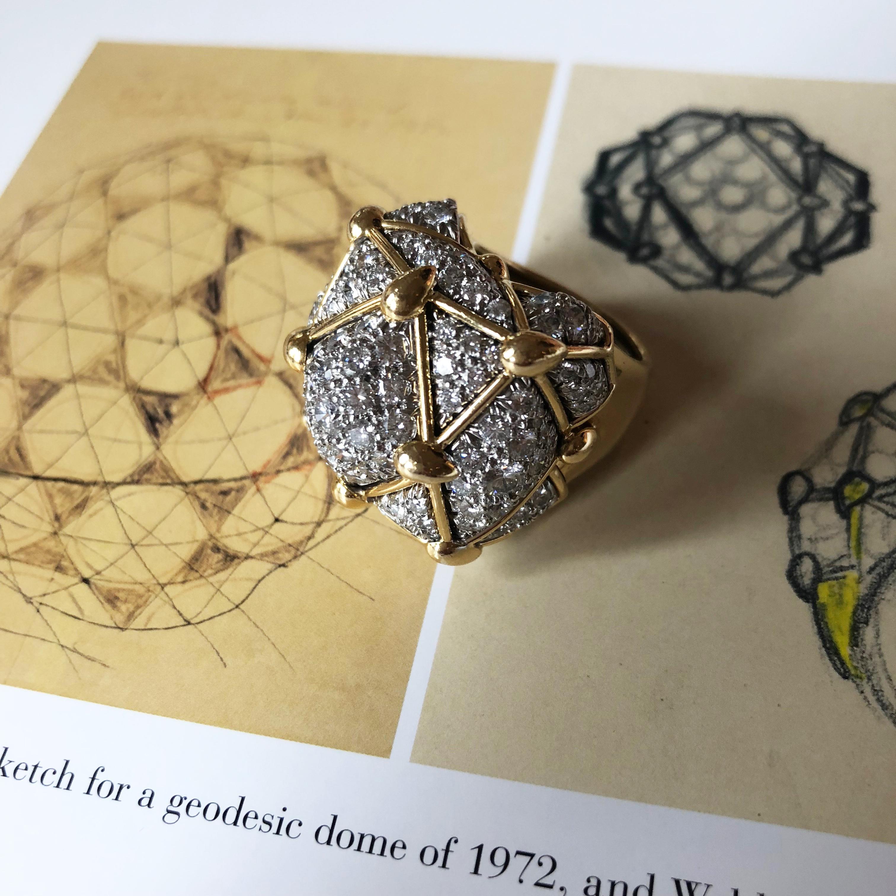A pavé-set diamond, platinum, and 18 karat gold Geodesic Dome ring, by David Webb, first made in c. 1965.

The ring measures a Size 05¾. It is signed WEBB, stamped 18k, and Plat. The ring has approximately 119 diamonds weighing 5 - 6 carats