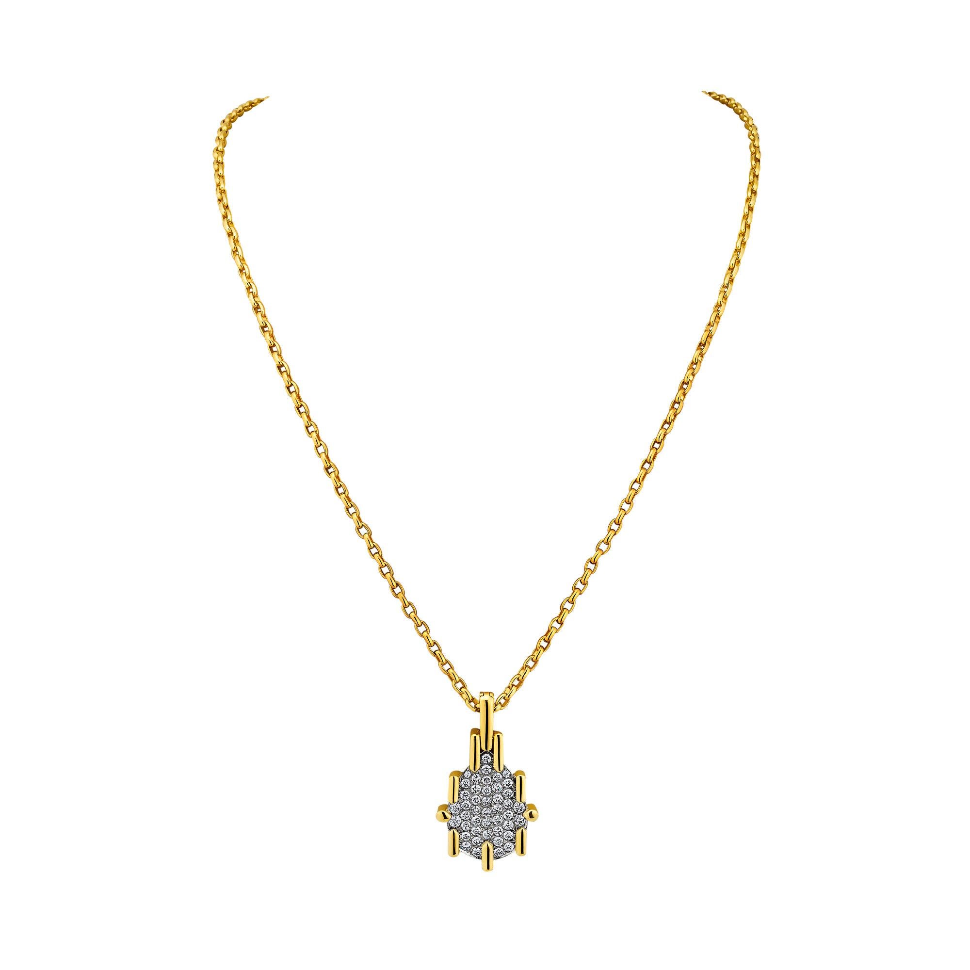 Let there be light!  And there always will be with this fiery diamond David Webb vintage pendant necklace.  With approximately 2.10 carats of round cut ultra bright white diamonds mounted in platinum and 18 karat yellow gold, this statement pendant