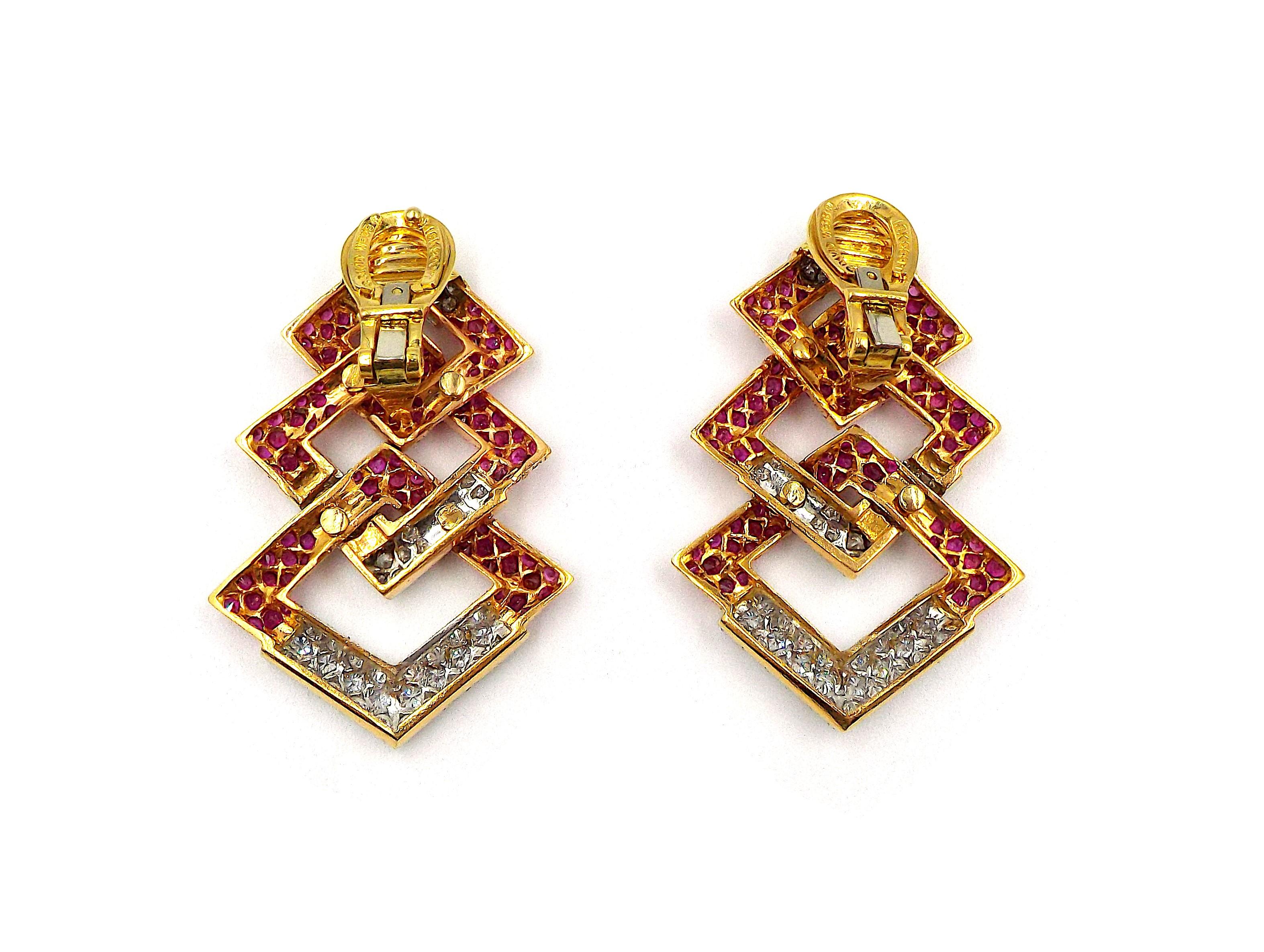 Pair of large 18k rose gold and platinum earrings by David Webb, set with approx. 7.50ctw in rubies and approx. 5.15ctw in diamonds. The earrings are 51mm x 35mm. Marked David Webb, 18k, 900PT. Weight is 42.8 grams.