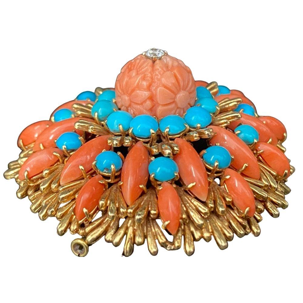 Unique carved coral pin, set in with a combination of turquoise, corals and diamonds made by David Webb. 

Made in 18K gold, and in overall excellent condition. 

Dimensions	55mm X 55mm
Metal 	18K Gold
