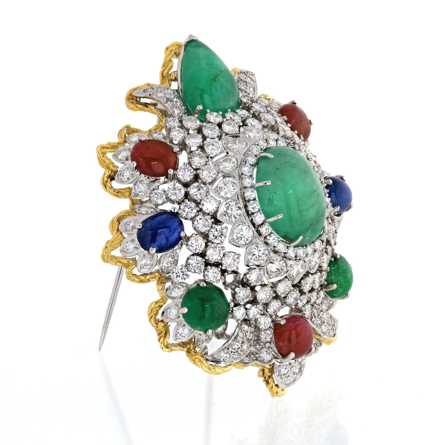 An impressive diamond and gemstone Heraldic Brooch from 1970's. Can also be worn as a pendant. 

Set with cabochon emeralds, rubies, and sapphires, brilliant-cut diamonds, 18K gold, and platinum.
Approx. diamond weight: 12.00cttw 
Diamond Quality: