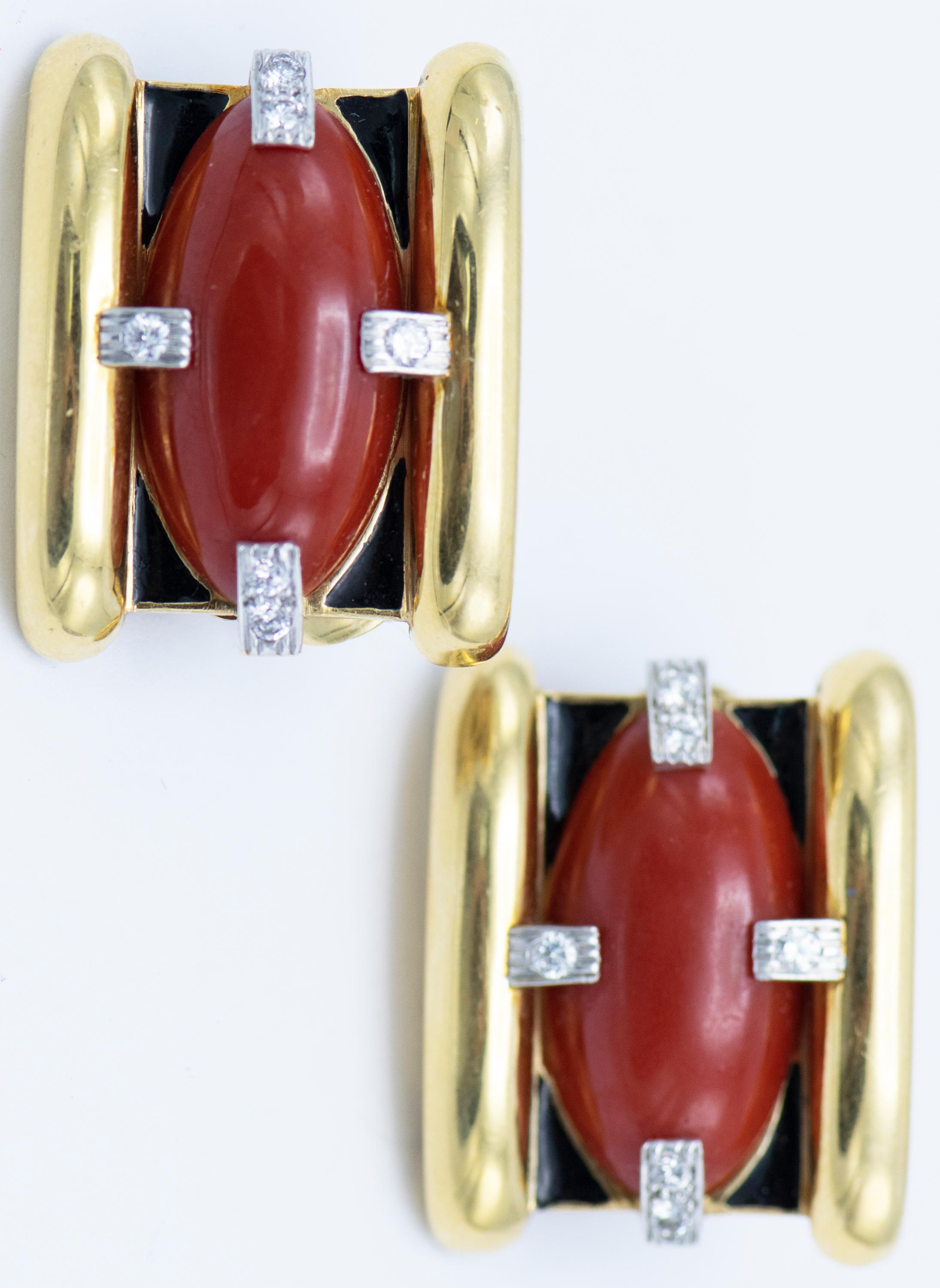 A Pair of 18 Karat Yellow Gold, Platinum, Coral, Diamond and Enamel Earclips, David Webb,containing two navette shape cabochon cut orangey red coral each measuring approximately 21.23 x 11.56 mm, and 12 round brilliant cut diamonds weighing