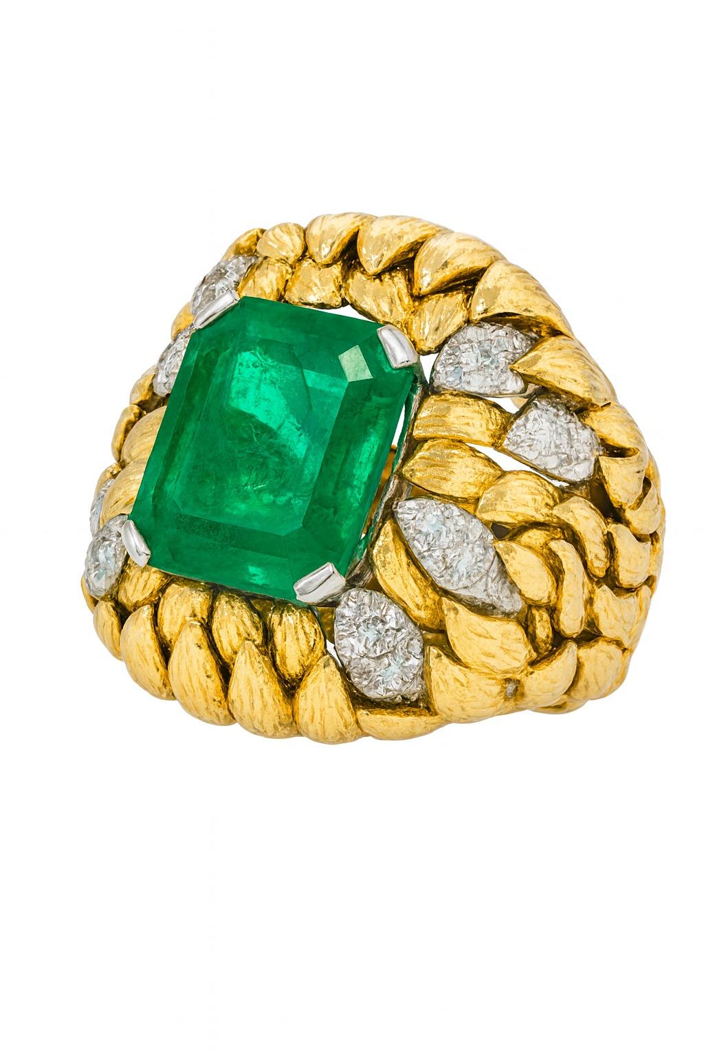 David Webb 6,00 Karat Smaragd und Diamant Platin & 18 Karat Gold Cocktail Ring

Ein auffälliger David-Webb-Cocktailring mit einem zertifizierten achteckigen Smaragd von 6,00 Karat, farbenprächtig und voller Charakter. 

Der Smaragd wird von zwei