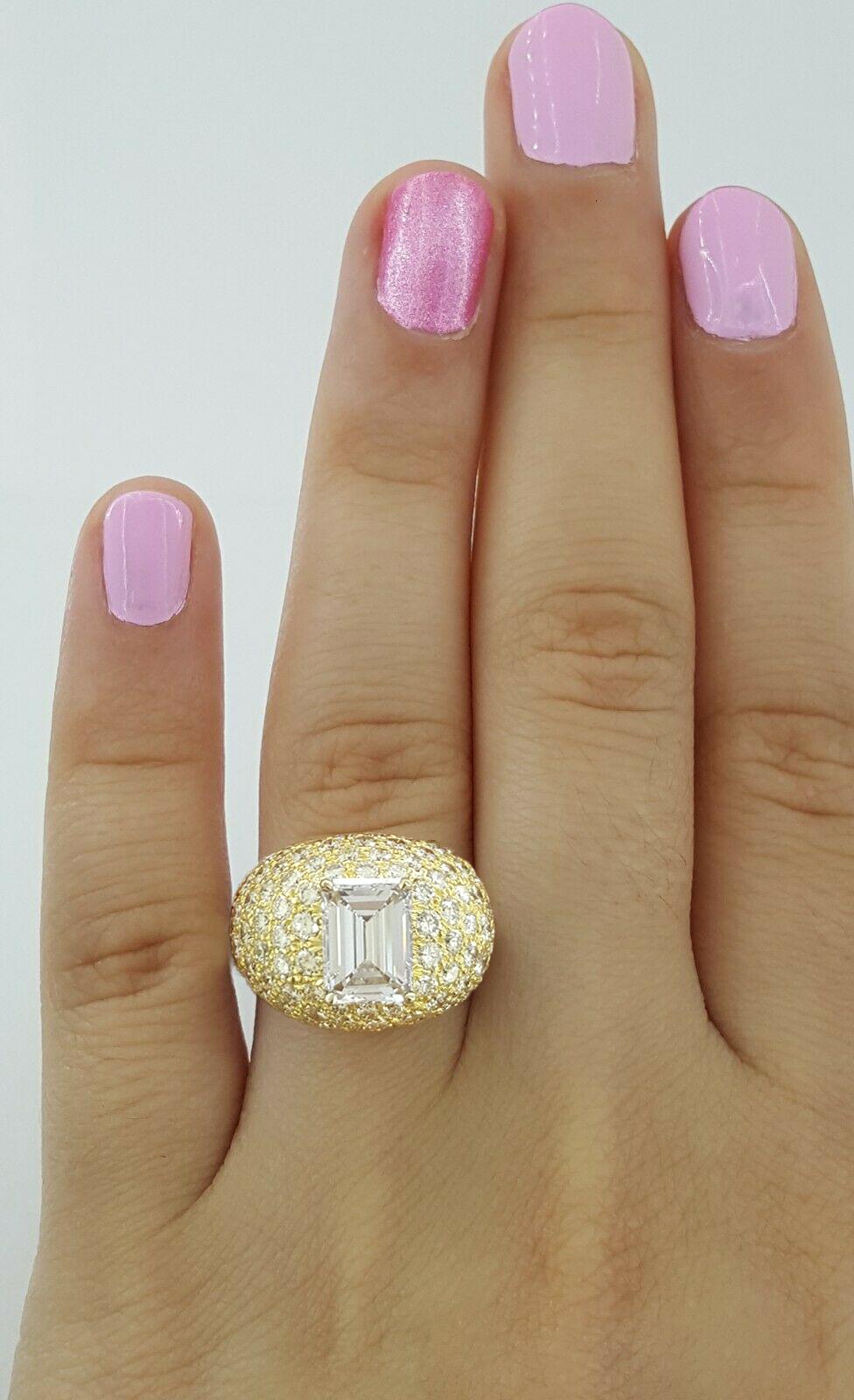 David Webb Emerald Cut Round Brilliant Pave Diamond Ring

the center stone weights 2.88 carats E color VS1 clarity

