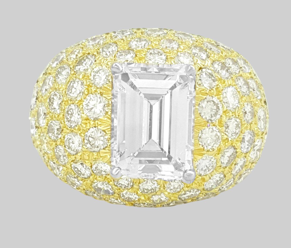 emerald cut and round brilliant diamond ring