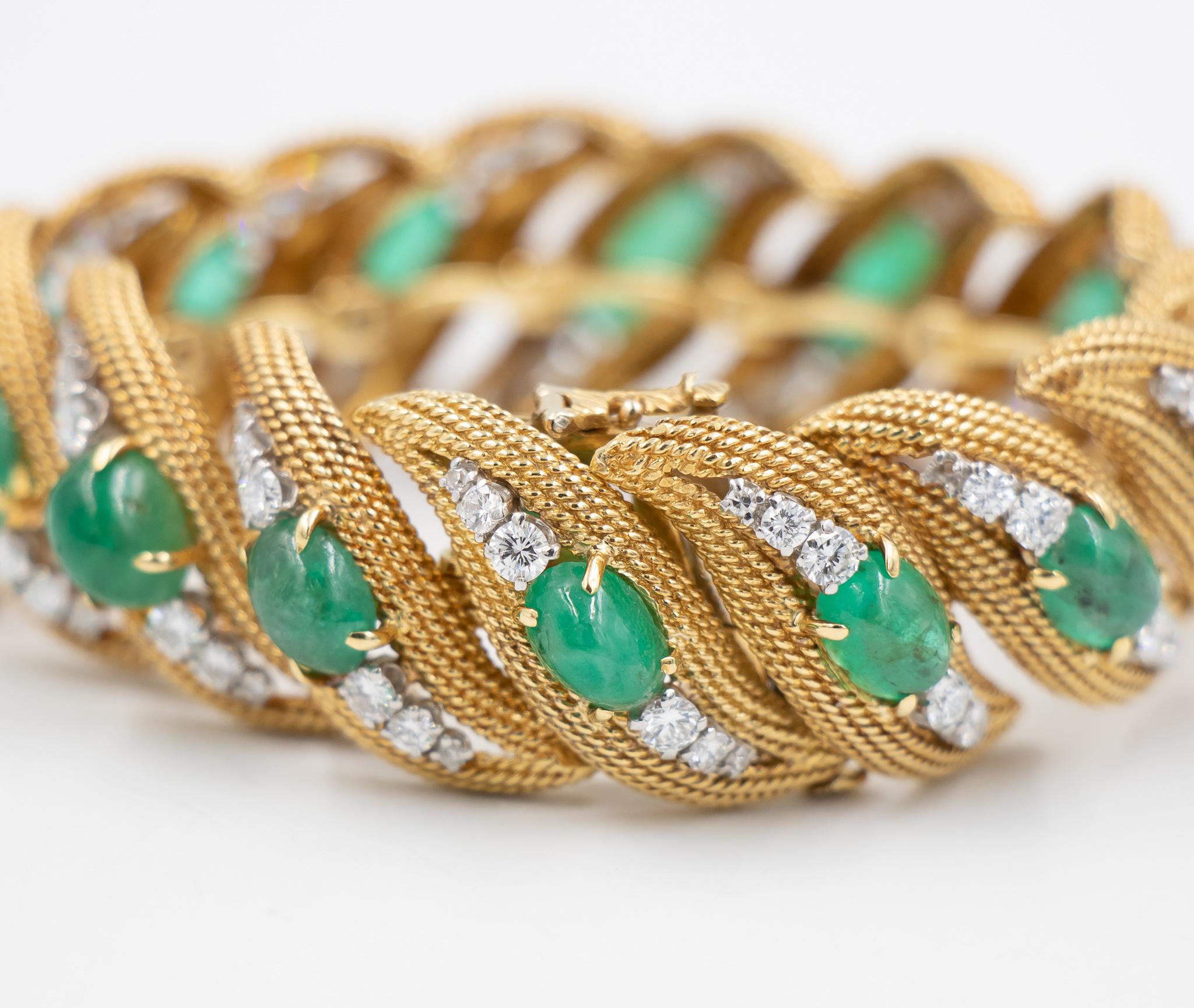 This incredible Graduated Emerald Ribbon  Bracelet was created by the iconic American jeweler, David Webb.  The cabachon emeralds accented by diamonds overlaying the 18k yellow gold is absolutely stunning in person.  The craftsmanship on this piece