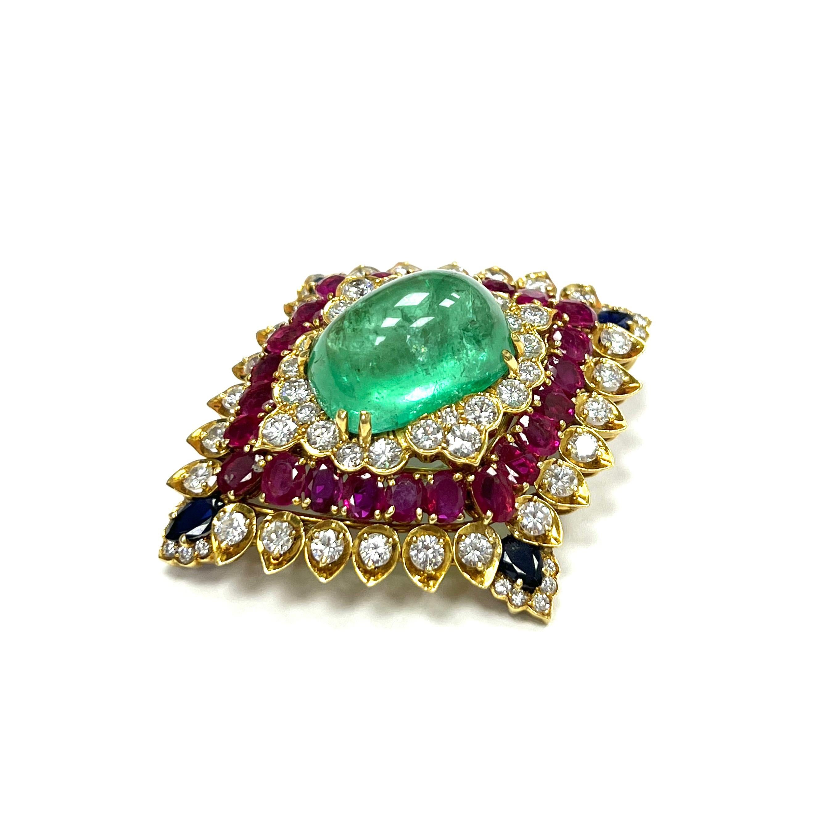 David Webb Emerald Diamond Ruby Sapphire 18k Brooch

Large cabochon emerald (13.5 x 20 mm) of approximately 22- 25 carats, round-cut diamonds of approximately 8 carats, oval-shaped rubies of approximately 10 carats, and pear-shaped sapphires of
