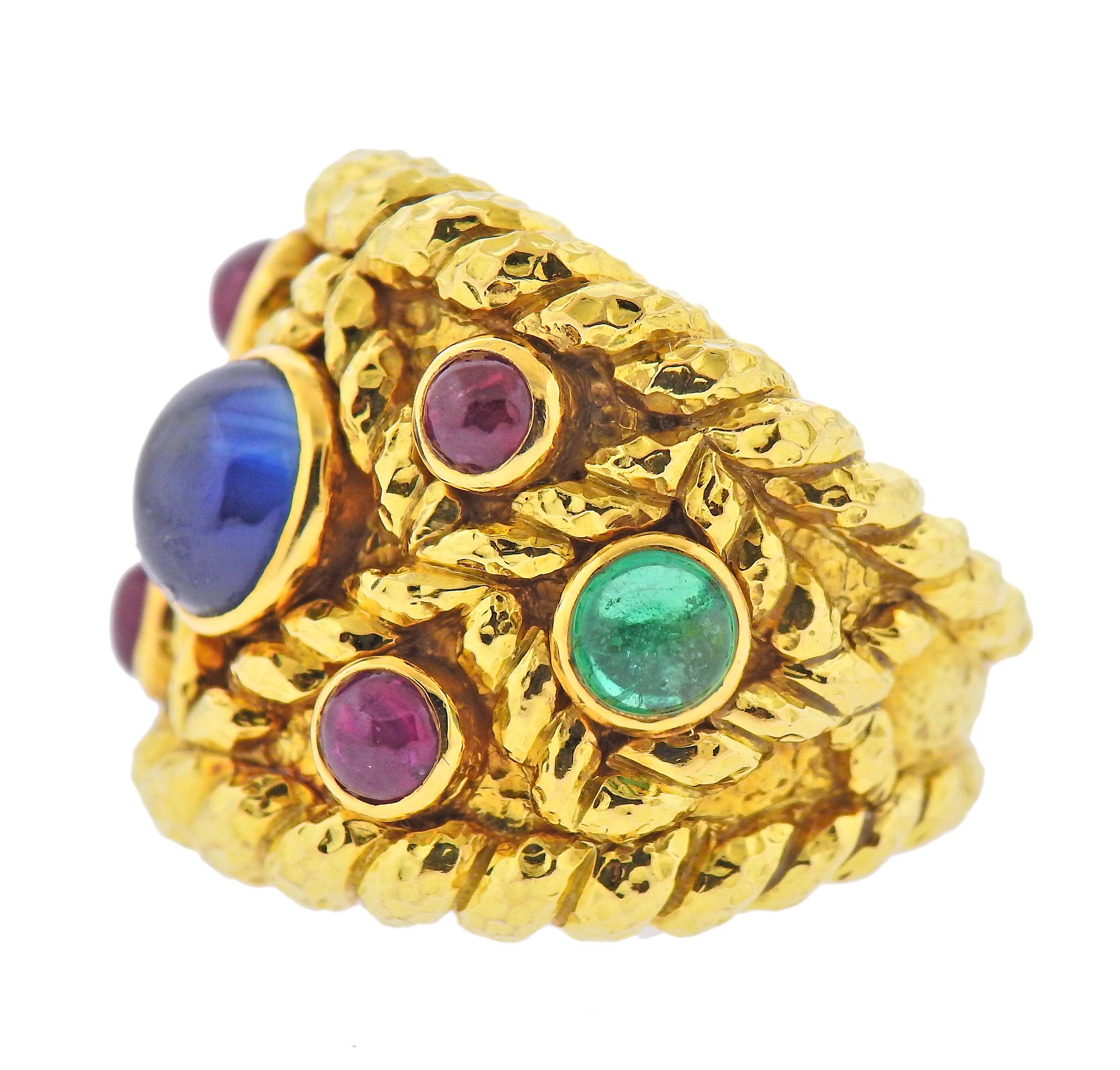 Large 18k hammered gold cocktail ring by David Webb, with sapphire, emerald and ruby cabochons. Ring size - 7, ring top - 25mm wide. Marked: Webb 18k. Weight - 35.9 grams. 