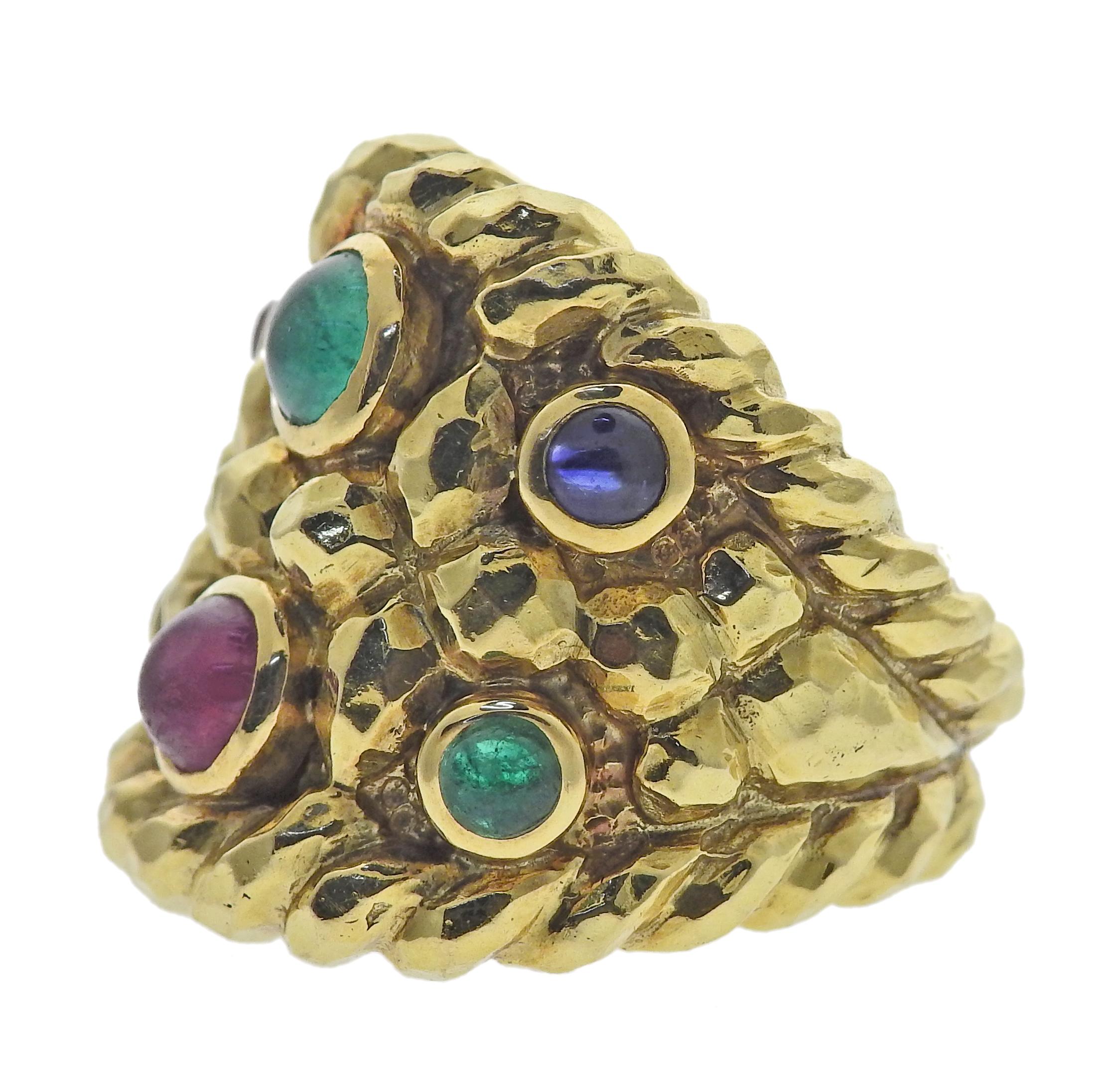 David Webb 18k Yellow Gold Ring set with Sapphire, Emerald and Ruby.  Ring size 6; top of the ring measures 25mm wide. Marked: David Webb, 18k,AA767. Weight is 27.7 grams.