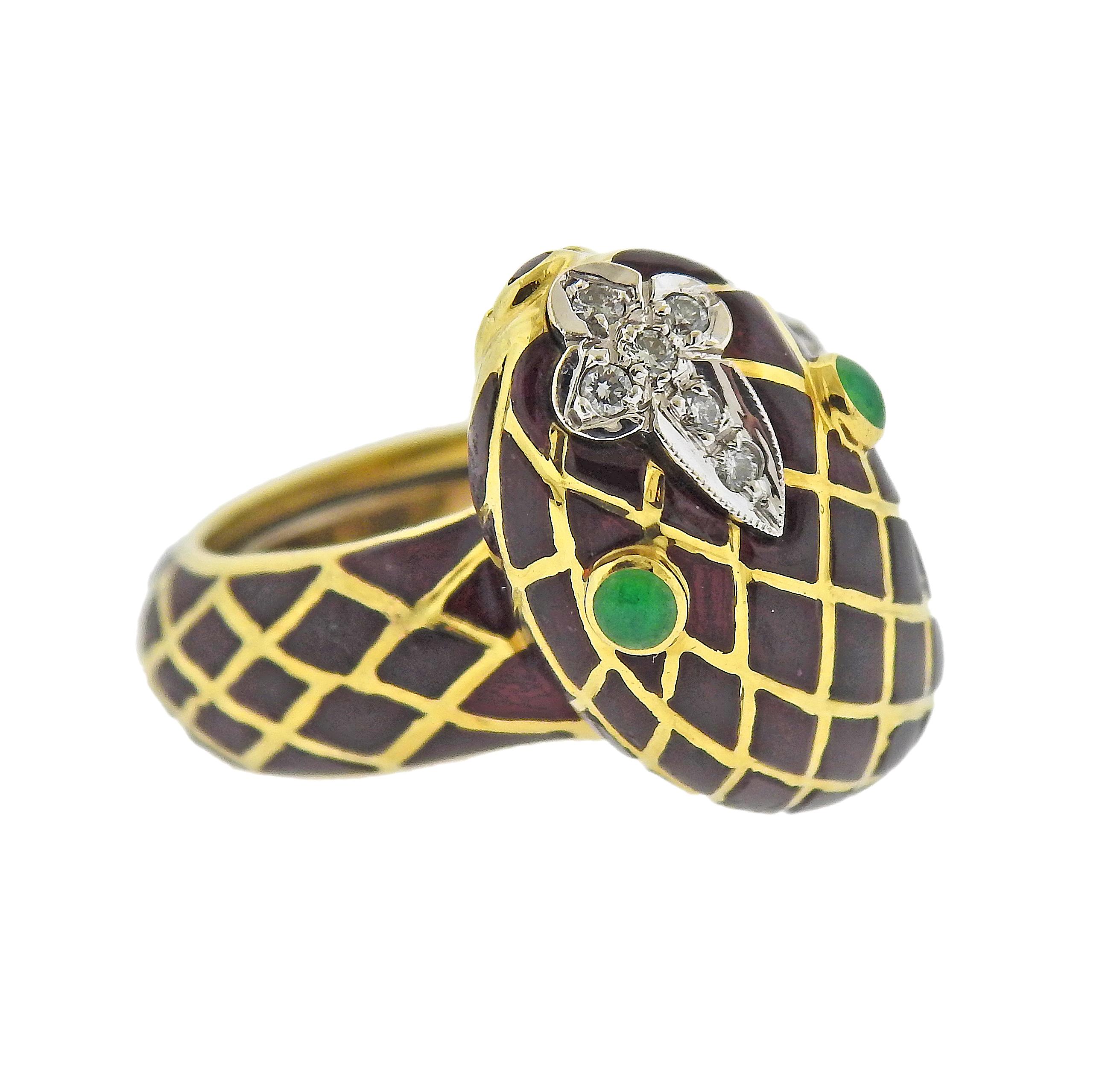 18k gold snake ring by David Webb, decorated with emerald eyes, approx. 0.24ctw in diamonds. Some abrasion on the enamel is present, particularly in the back of the ring. Ring size - 5.5, ring top - 20mm wide. marked: Webb, 18k. Weight - 18.9 grams.