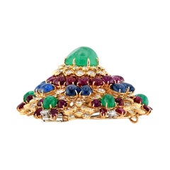DAVID WEBB Estate 18k Emerald, Diamond, Sapphire, and Ruby Starburst Brooch