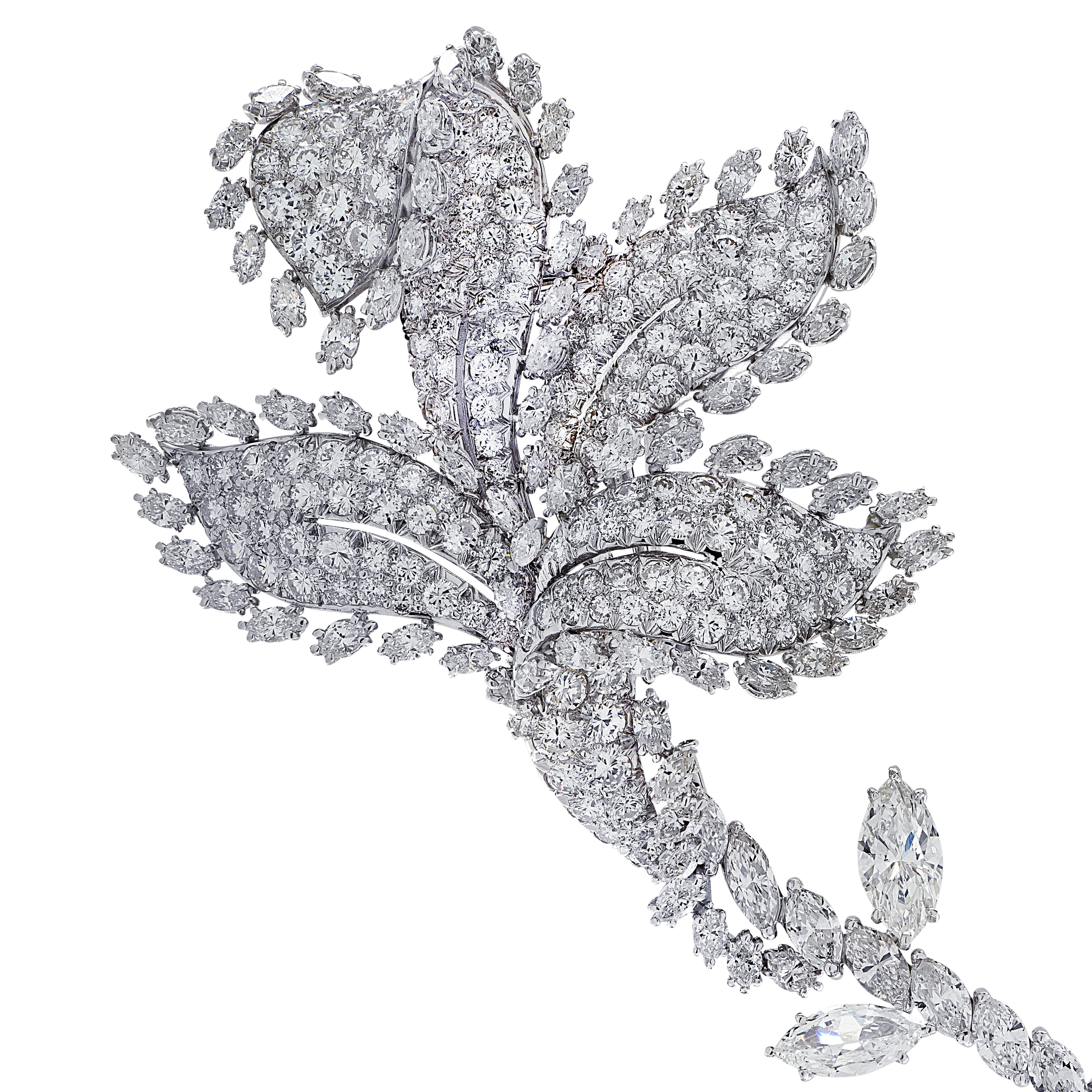 Truly spectacular David Webb brooch pin finely crafted in platinum, showcasing a breathtakingly beautiful flower encrusted in 271 mixed cut diamonds weighing approximately 18.92 carats total, G-H color, VS clarity. This sensational brooch pin is