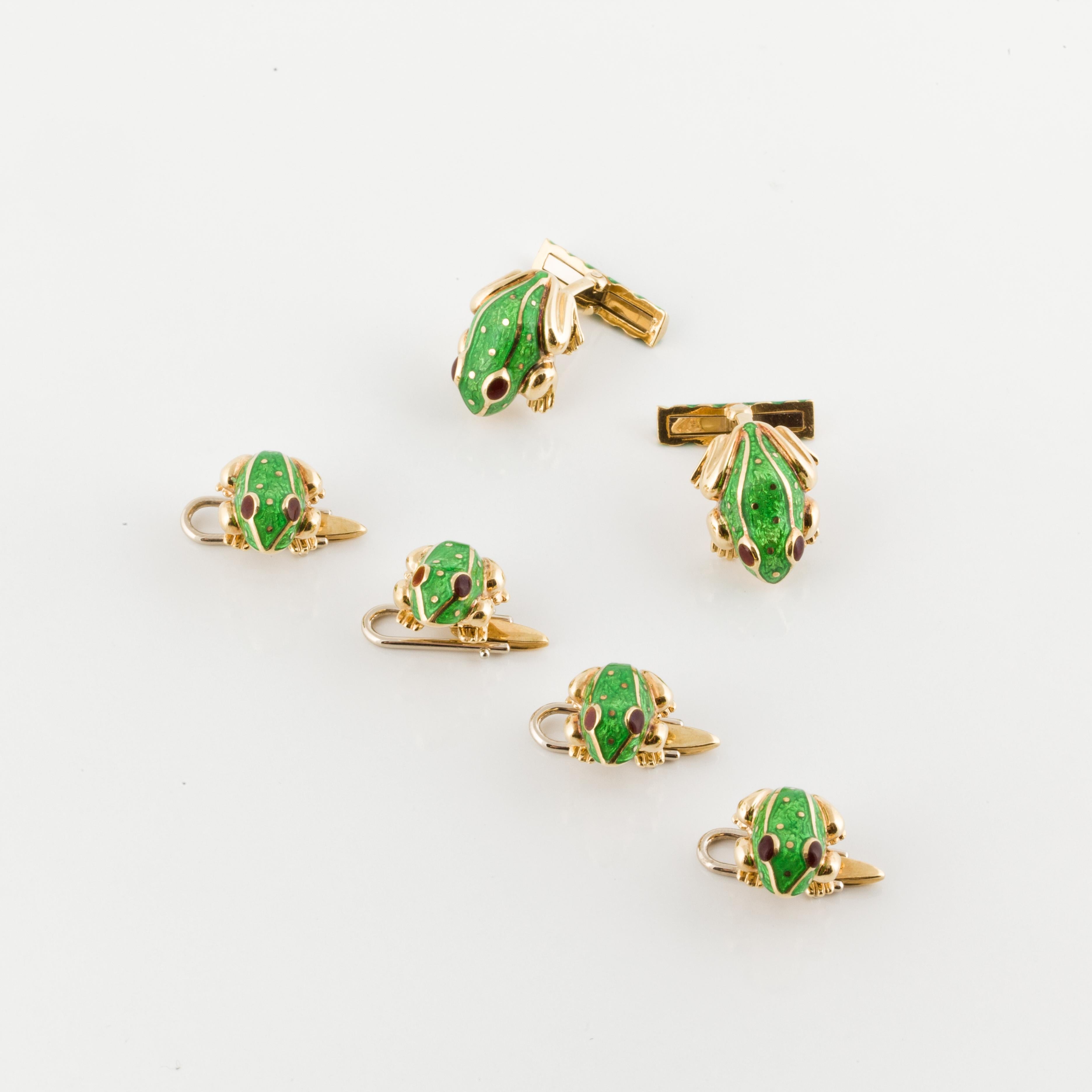 David Webb 18K yellow gold frog dress set composed of cufflinks and 4 studs. The frogs are enameled green.  The cuff links measure 3/4 inches long and the four studs measure 5/8 inches each.  
