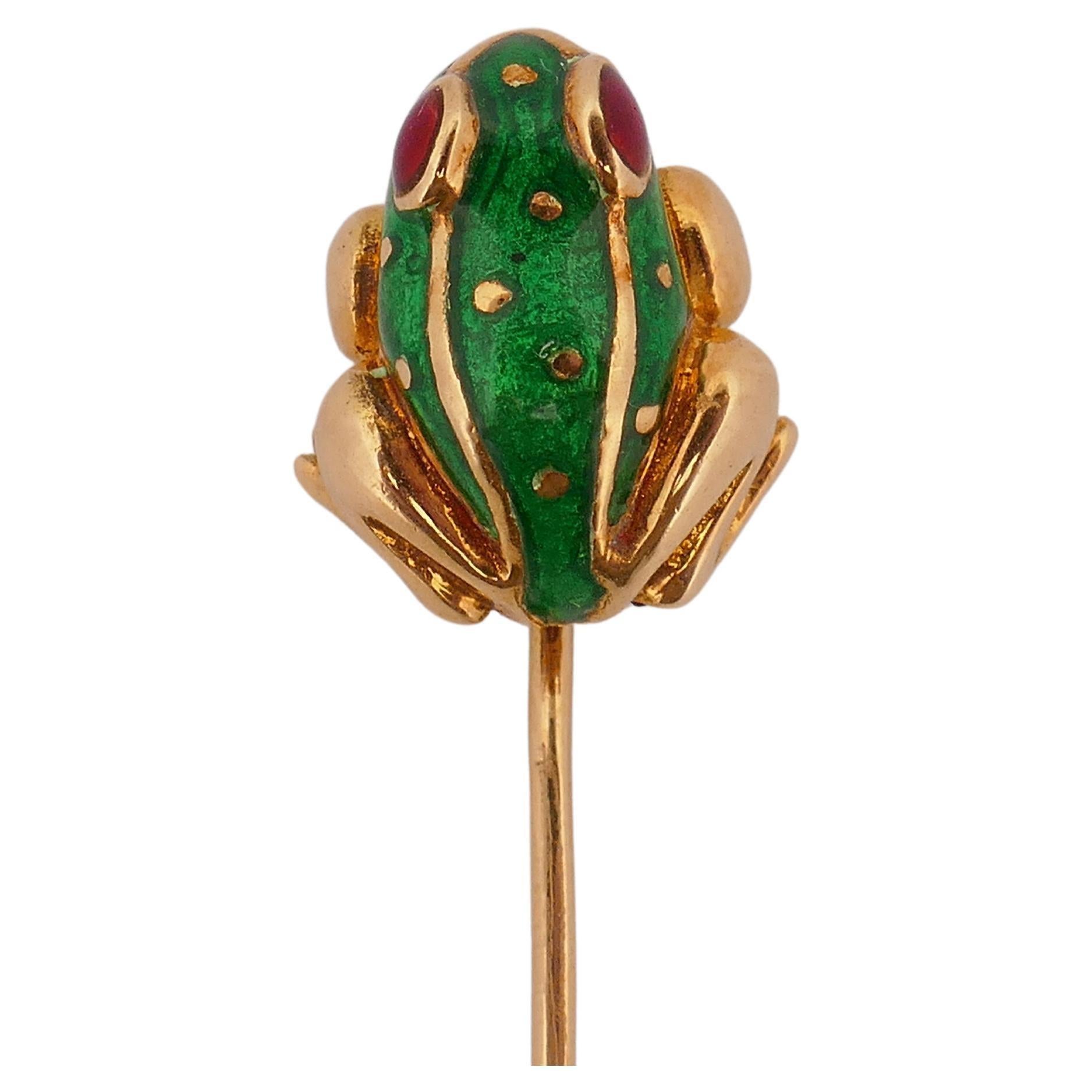 A cute and fun David Webb Frog pin brooch, made of 18k gold and enamel. 
This Webb small frog brooch features ruby eyes.  The ruby is cabochon cut. 
The pin belongs to Kingdom collection.
This colorful yet classy pin is charismatic and overall