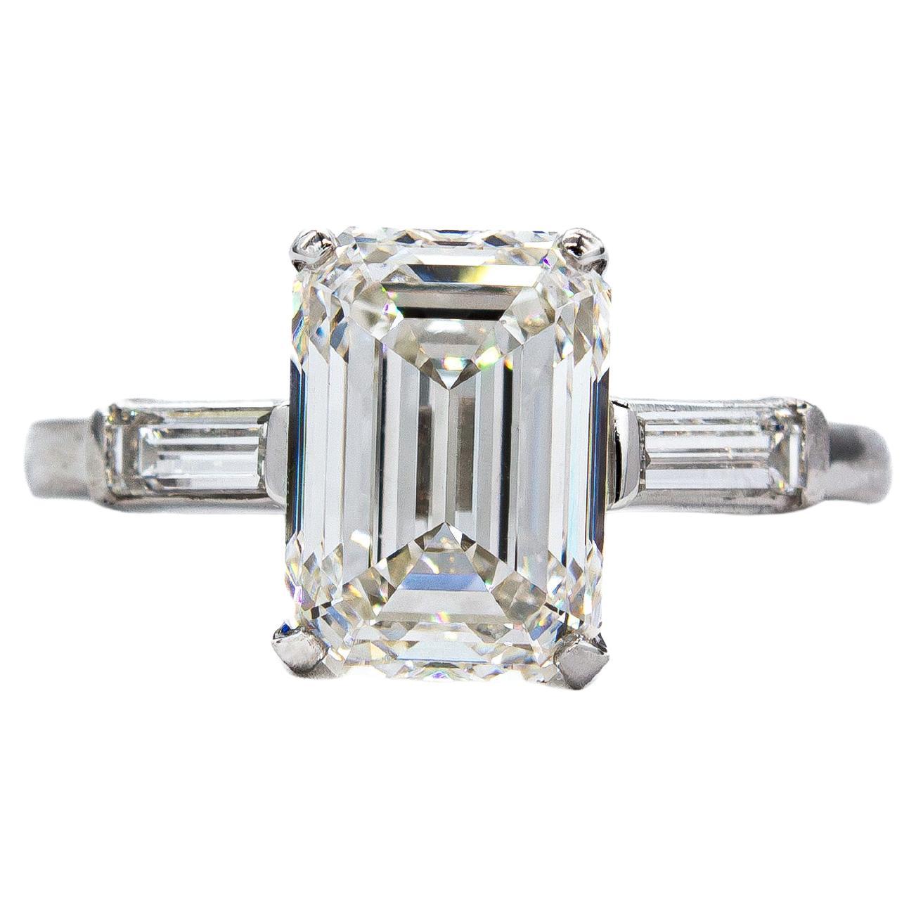 David Webb GIA Certified 5.01 Carat F VS1 Emerald Cut Diamond Three Stone Ring