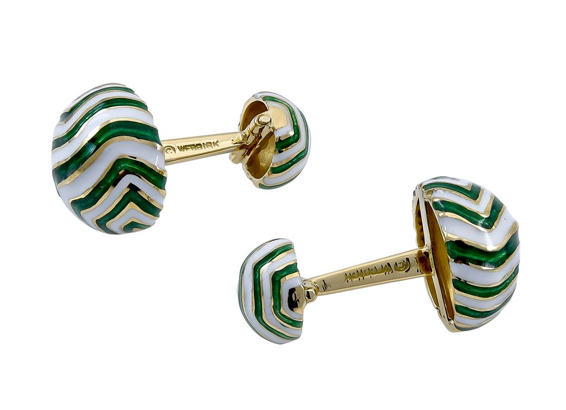 Vibrant emerald green and white enamel cufflinks.  Made and signed by DAVID WEBB.  Heavy gauge 18K yellow gold.  Double-sided.  Striking in color and design.

Alice Kwartler has sold the finest antique gold and diamond jewelry and silver for over