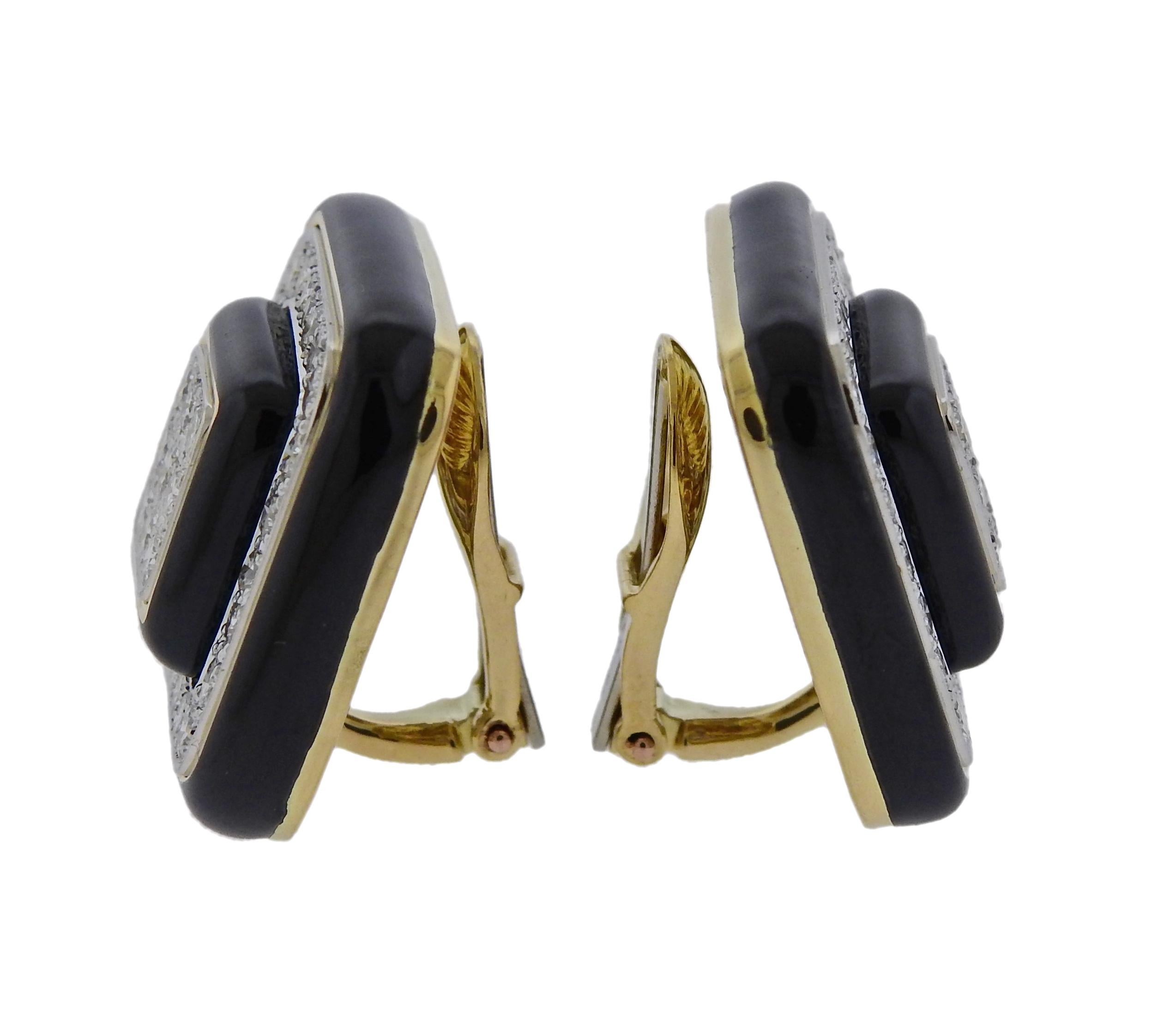 Pair of 18k gold and platinum earrings, crafted by David Webb, set with black enamel and approx. 3.30ctw in H/VS diamonds. Earrings are 23mm x 23mm and weigh 33.9 grams. Marked Webb, Plat, 18k