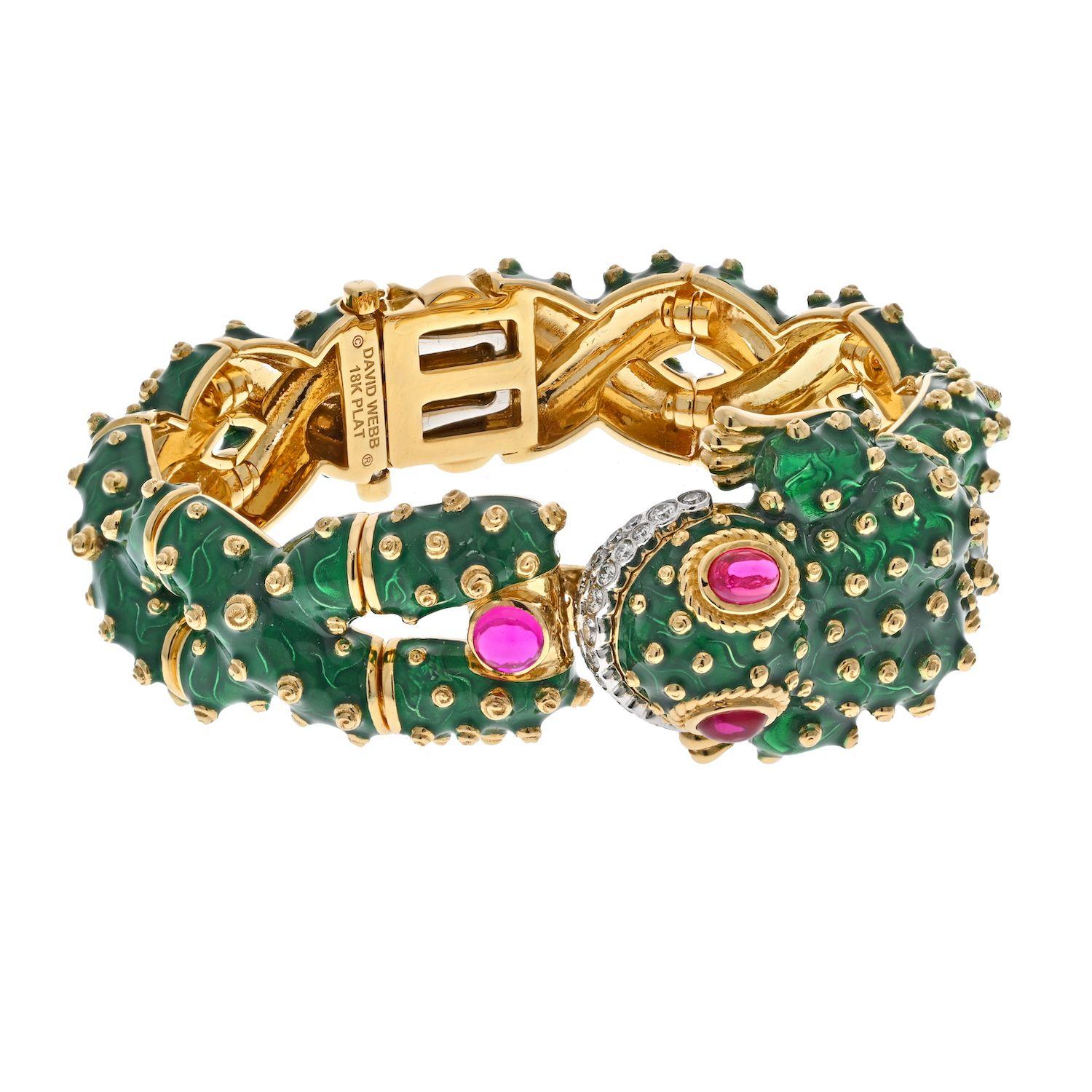 This gorgeous David Webb Frog bracelet is amazing and for a smaller wrist. 
Made in 18 kt., the stylized frog with braided legs applied all over with green enamel, accented throughout with polished spiraled gold balls, with oval cabochon ruby eyes,