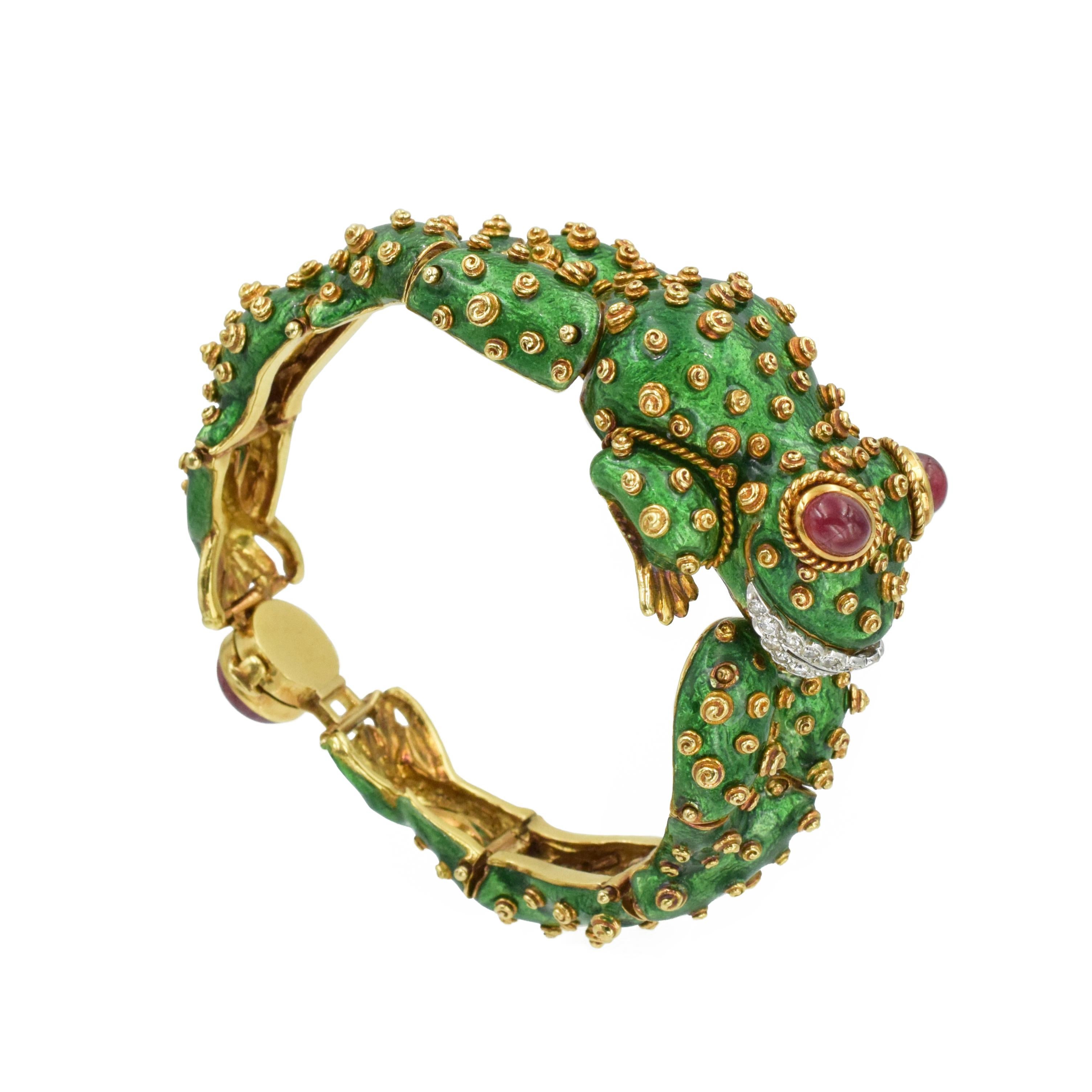 David Webb Green Enamel Frog Bracelet.  Set with 2 oval cabochon cut rubies
 and and one round cabochon cut ruby  weighing total of approximately 6.0carats, and 22 brilliant round
diamonds with an approximate total weight of 0.50carats
 Color G/H,