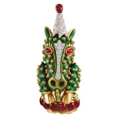 David Webb Broche licorne en or, émail vert, rubis et diamants