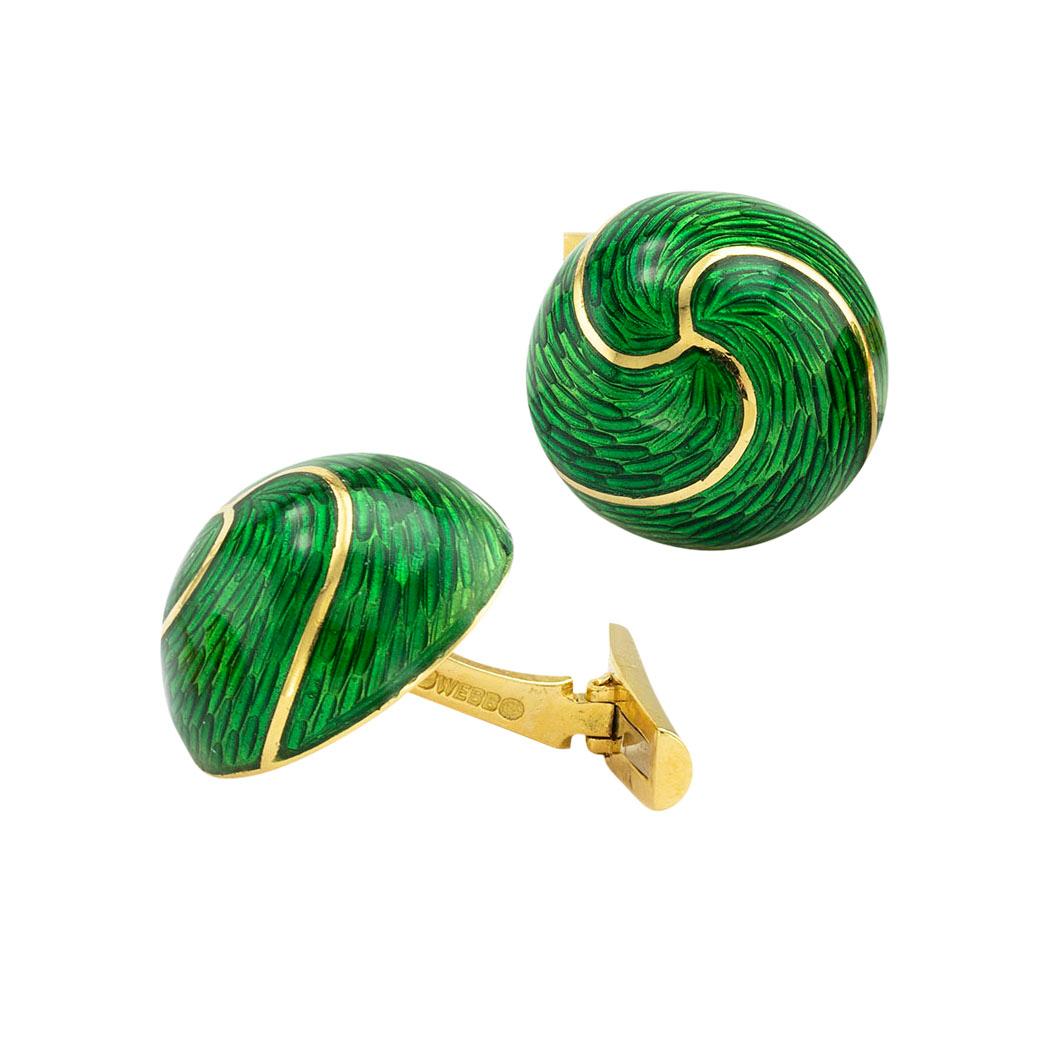 David Webb green enamel and yellow gold cufflinks circa 1980. *

ABOUT THIS ITEM:  #P-DJ716F. Scroll down for specifications.  The color of the green enamel combined with the domed design and the champlevé gold work is elegant and masculine,