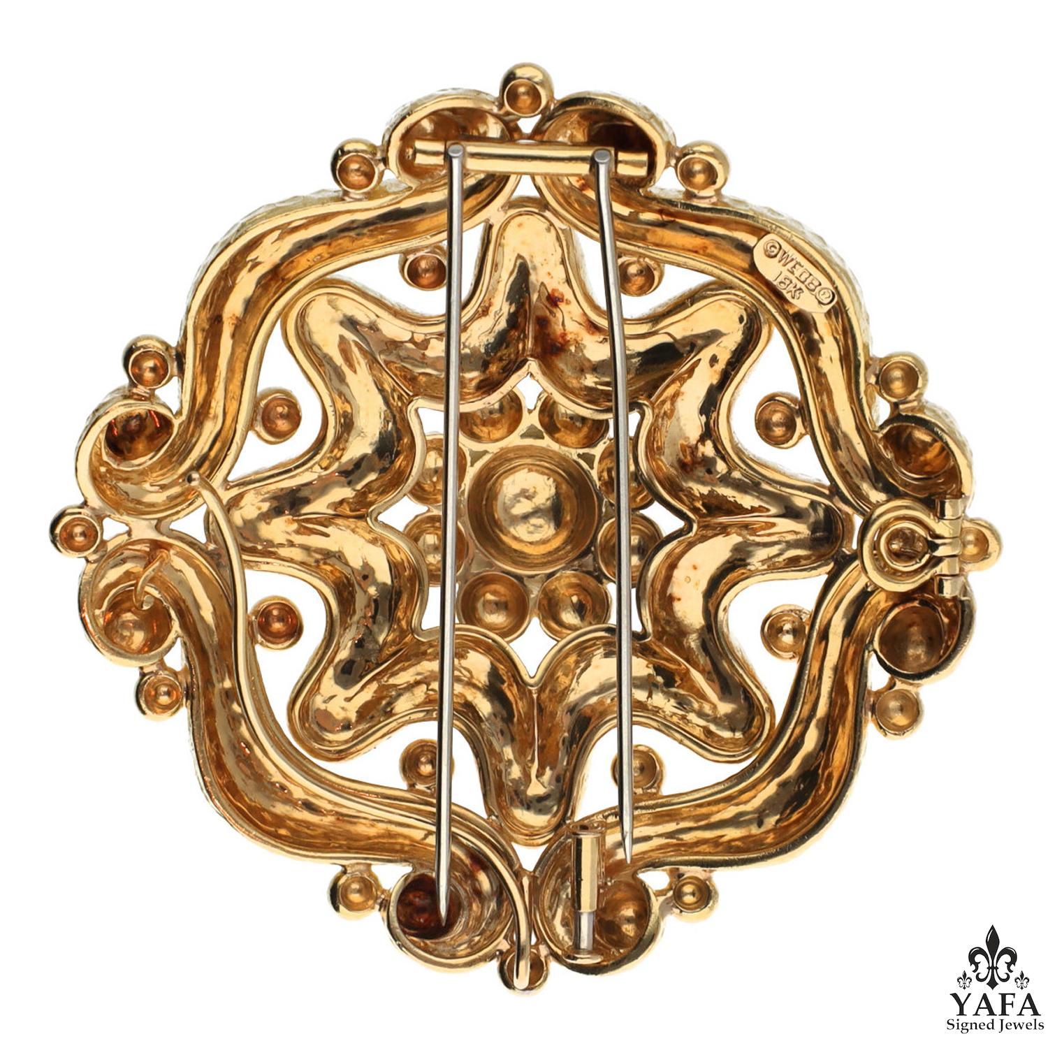 A remarkable hammered large brooch pendant of openwork design, stylized as a floral motif, enhanced by gold beads, finely crafted in 18k yellow gold. The diameter measures approximately 2.5″ x 2.5″ with a gross weight of approximately 65.6