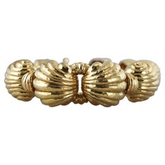 David Webb Pulsera gruesa de oro amarillo con acabado martillado a mano