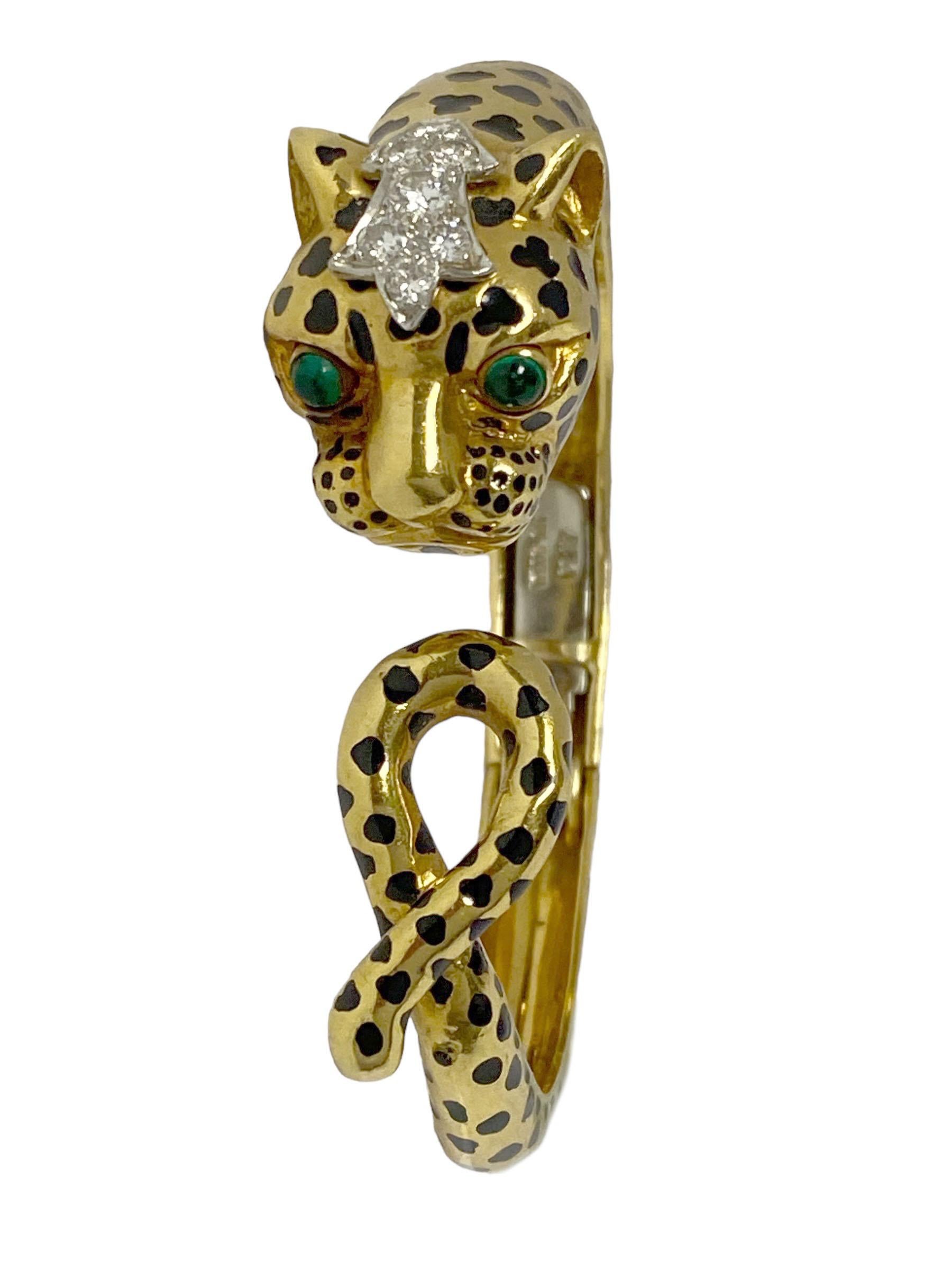 Circa 2000 David Webb Iconic Leopard hinged Bangle Bracelet, the head measures 1 x 3/4 inch with the bracelet tapering from 5/8 to 1/4 inch in width, finely detailed with the Famous David Webb Enameling, the top of the Head is set with Round