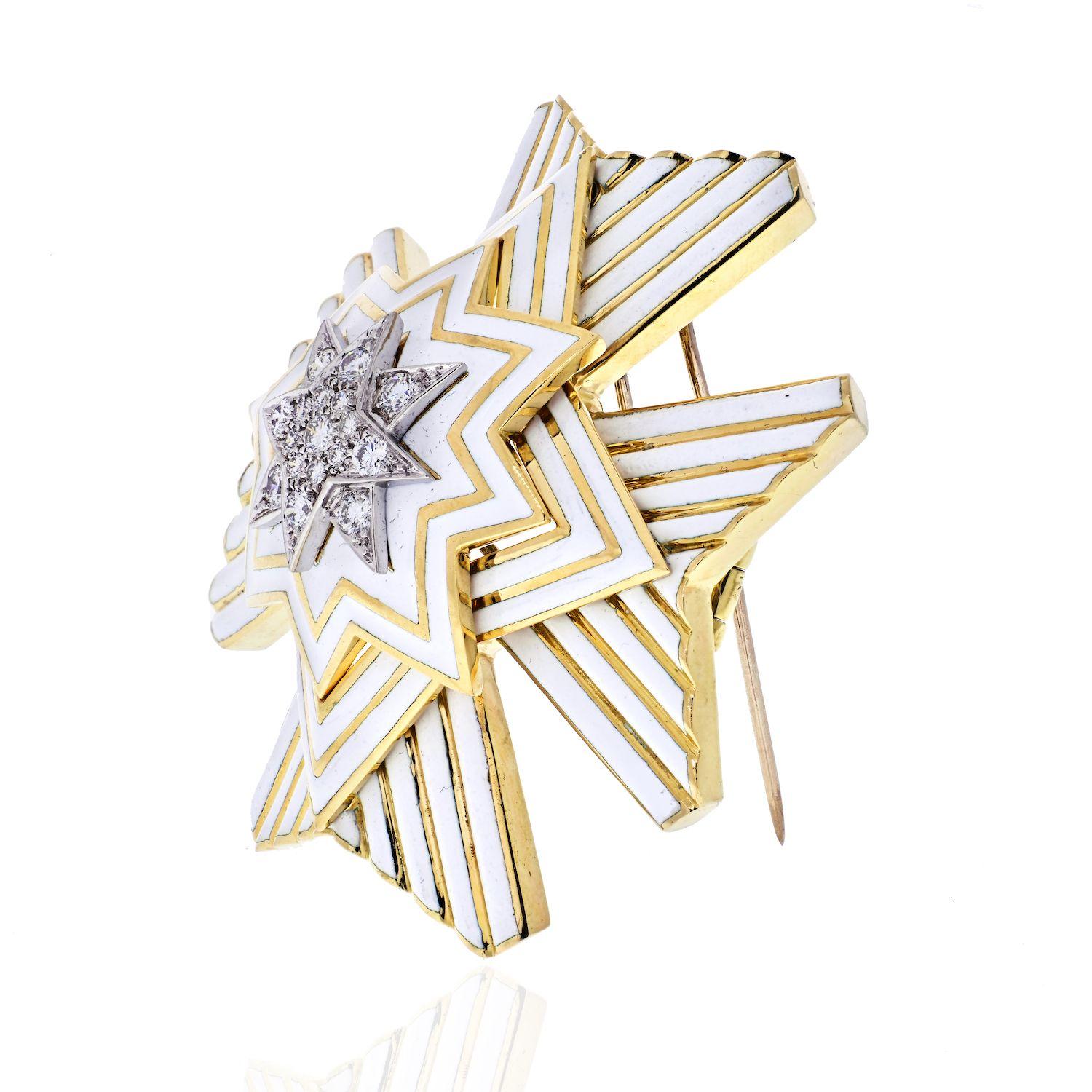 This important vintage David Webb Maltese cross pin/pendant is remarkable. It is composed of 18K yellow gold and platinum with white enamel and diamonds. 
This brooch can be worn as a pendant as well as a brooch and it is large 56mm wide x 56mm