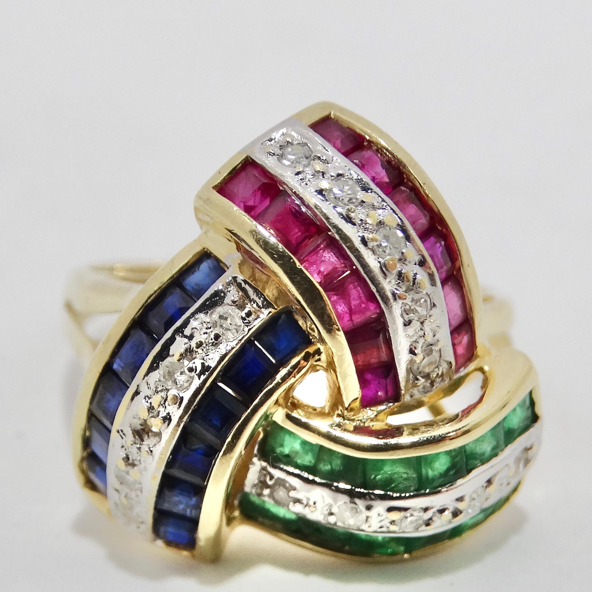 Introducing the David Webb Inspired Sapphire, Ruby, Emerald, and Diamond 1960s Ring, a magnificent piece that exudes timeless glamour and captures the essence of vintage luxury. This stunning ring features a selection of exquisite gemstones - red