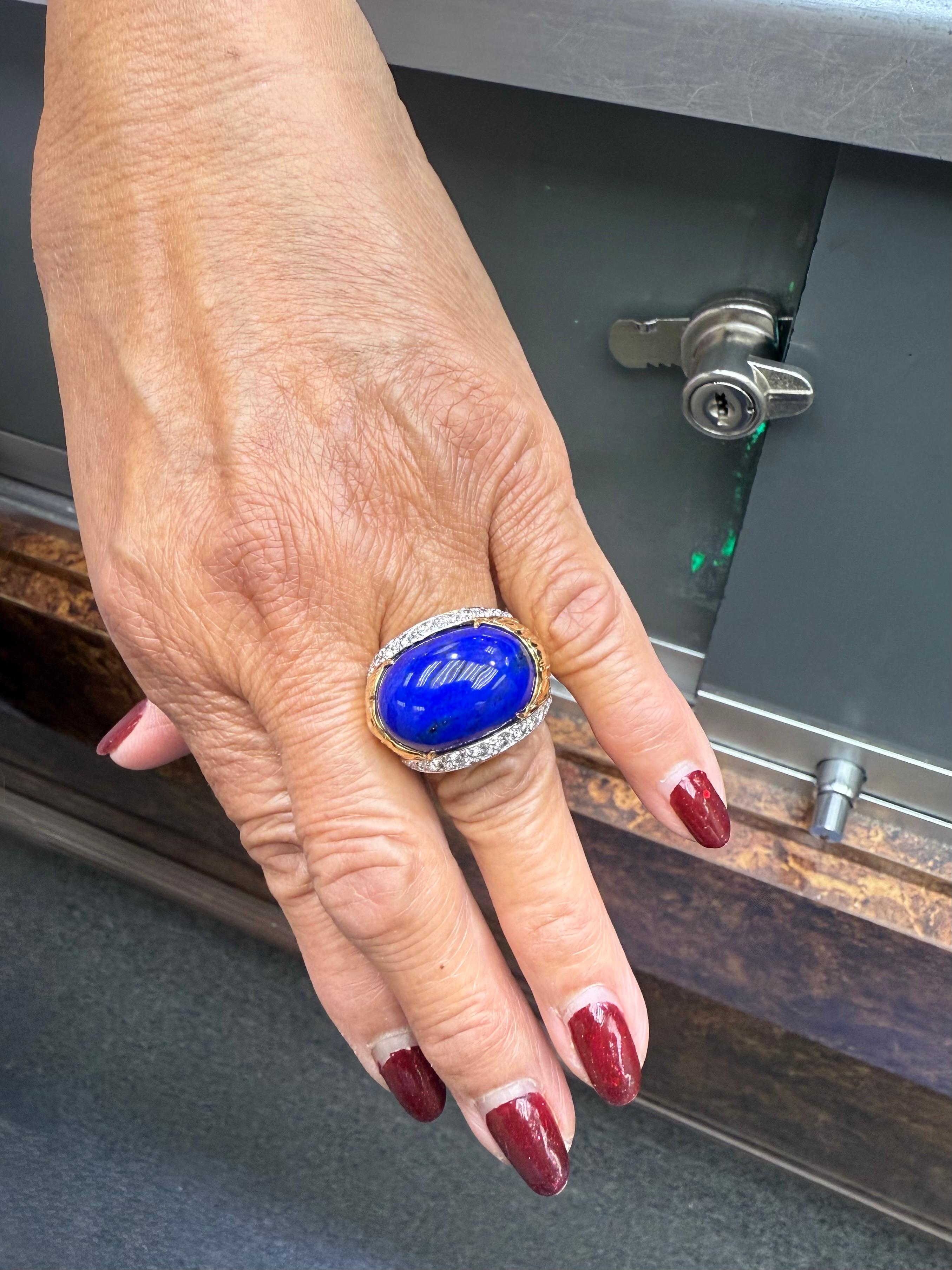 David Webb Lapis Diamond 18k yellow gold and platinum dome ring, circa 1990s.

This David Webb Lapis and Diamond 18k yellow gold and platinum dome ring from the 1990s is a very special ring. Designed as a dome ring set with a centered cabochon royal