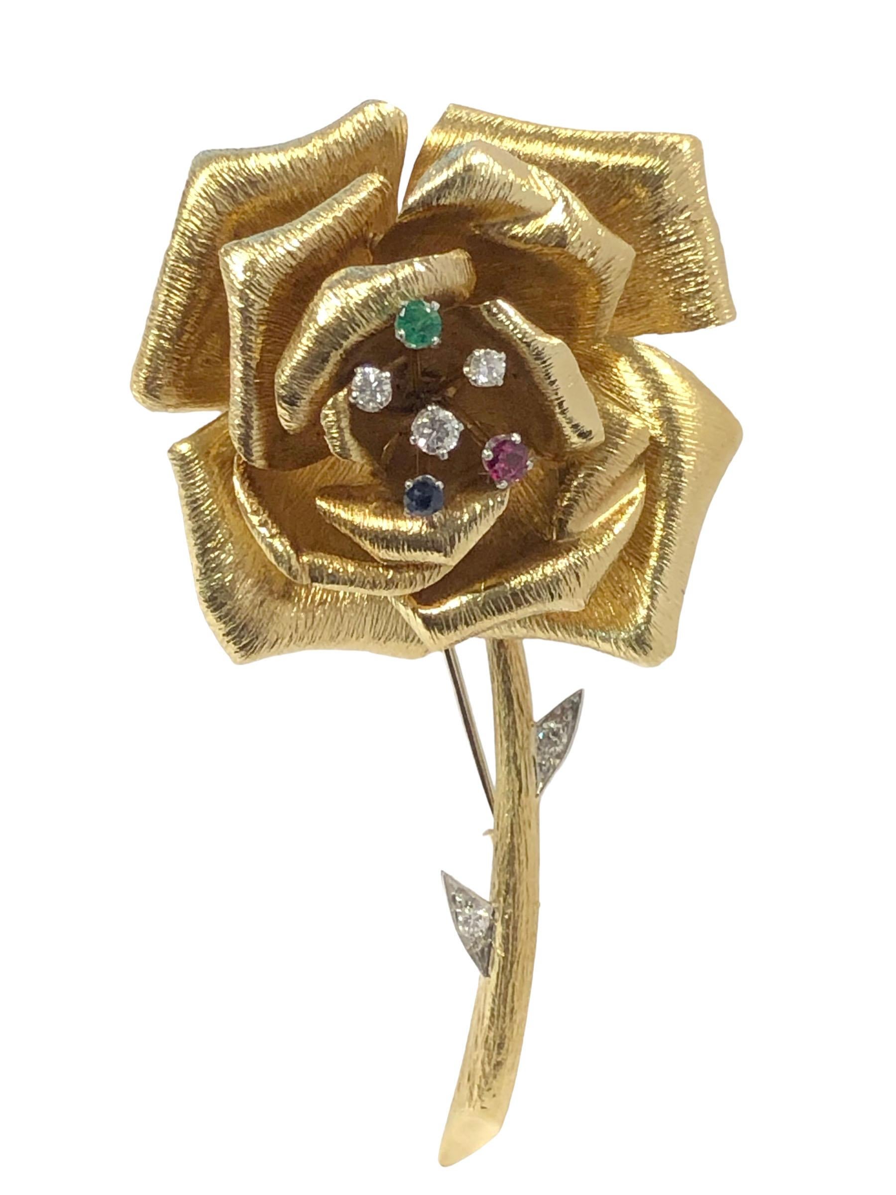 Circa 1970s David Webb 18k Yellow Gold Flower Clip Brooch, measuring 3 1/4 inches in length with the flower Portion measuring 2 inches in diameter and weighing 34 Grams,  assembled in 3 sections with the inner portion of the flower being slightly