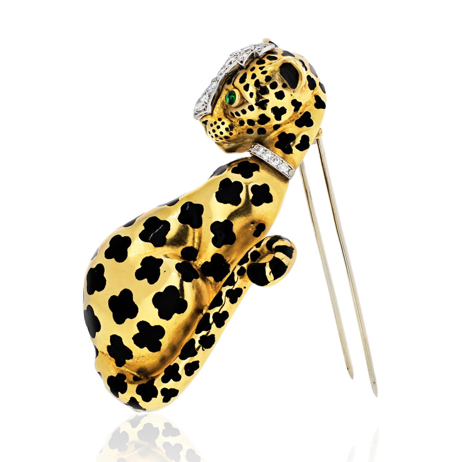 Recognizable and iconic this David Webb Leopard Brooch is crafted in 18 Karat Yellow Gold, set with round Diamonds, Emerald eyes, and black enamel. 

Sweet and romantic this Leopard brooch will start conversations the moment you put it on.