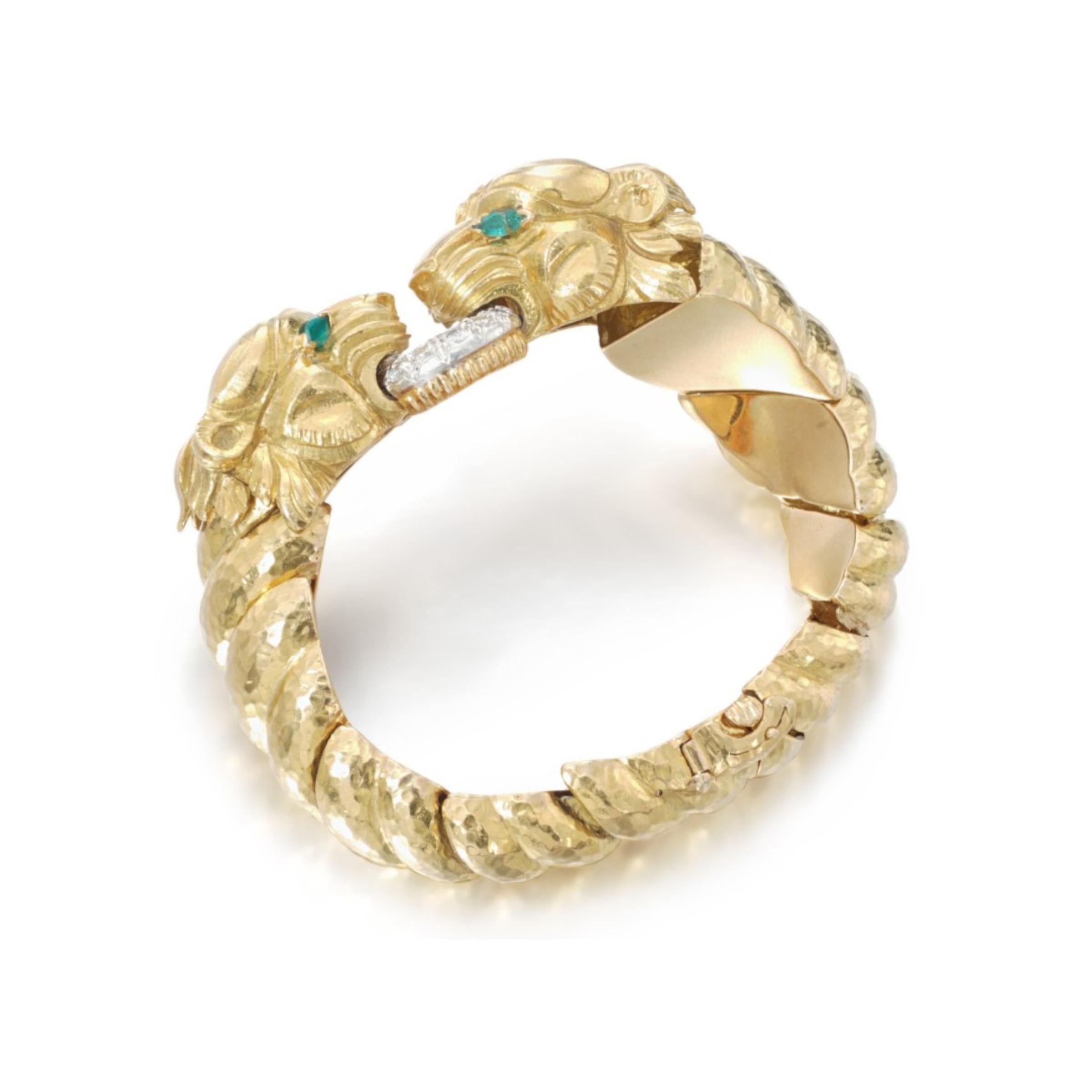 David Webb Lion Emerald Diamond & Gold Bracelet

18k Gold

Signed David Webb

Length: approximately 7 inches