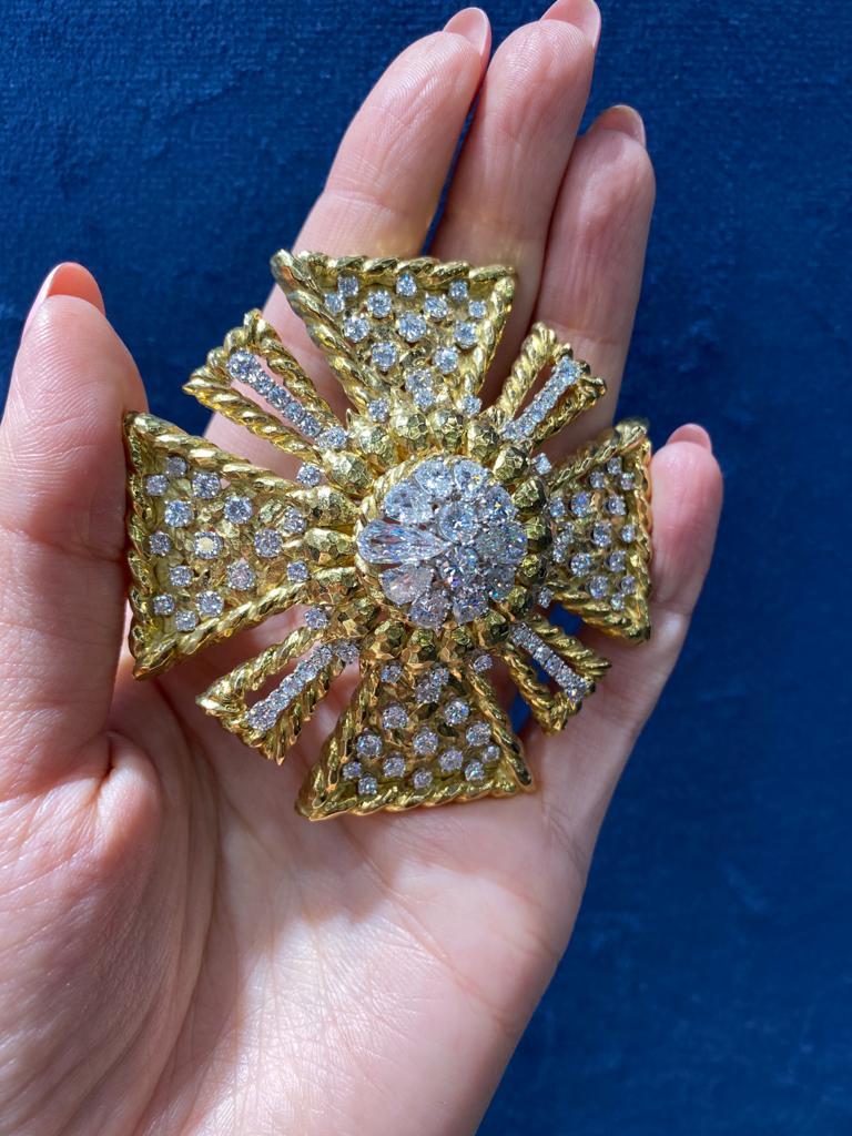 Vintage David Webb diamond & 18K gold large size brooch/pendant. 
The shimmering diamonds weigh approximately 10.50 carats, ranging F to G color and VS clarity. A breath-taking and dazzling piece, this gorgeous brooch deserves someone with