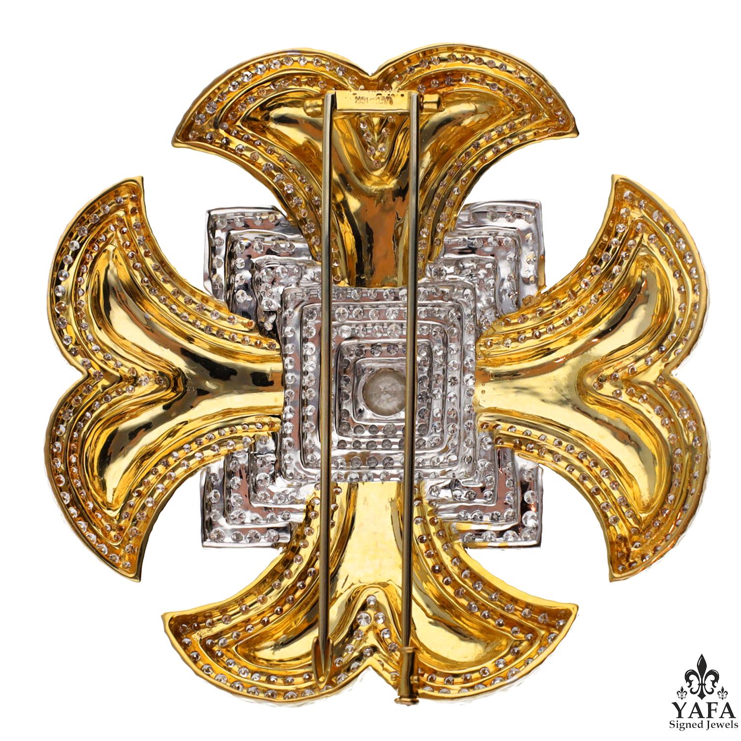 DAVID WEBB Maltese Cross Diamond Brooch in 18k Yellow Gold and Platinum.

An exquisitely textured gold design emblematic to David Webb, the Maltese Cross motif has been seen in various iterations throughout the years of the brand. The center of this