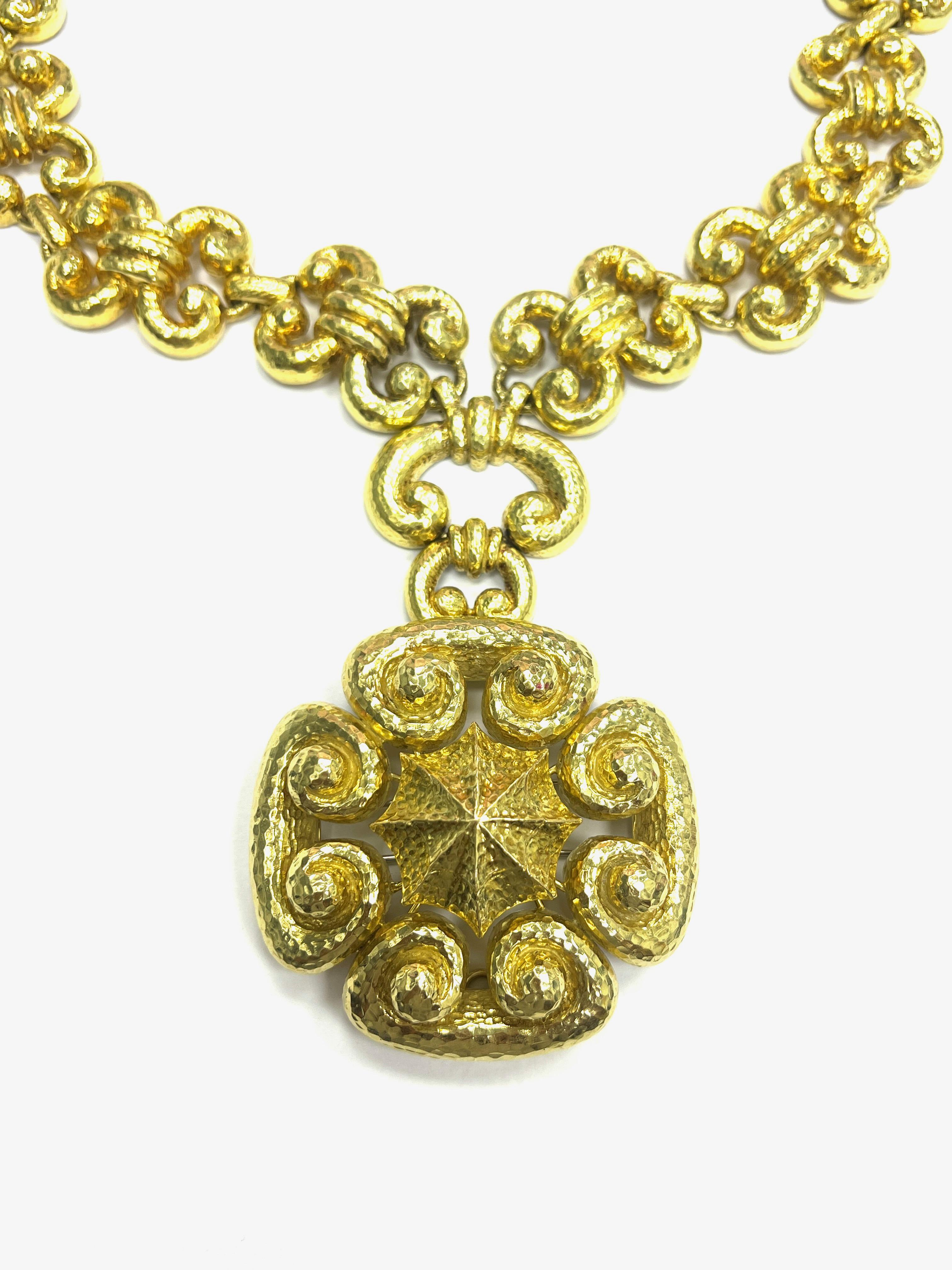 David Webb One of A Kind Hammered 18k Yellow Gold Pendant Necklace

A massive and heavy 18 karat yellow gold hammered necklace with a detachable pendant that can be converted into a brooch; marked David Webb, Webb 18k

Size: Necklace width 1.19